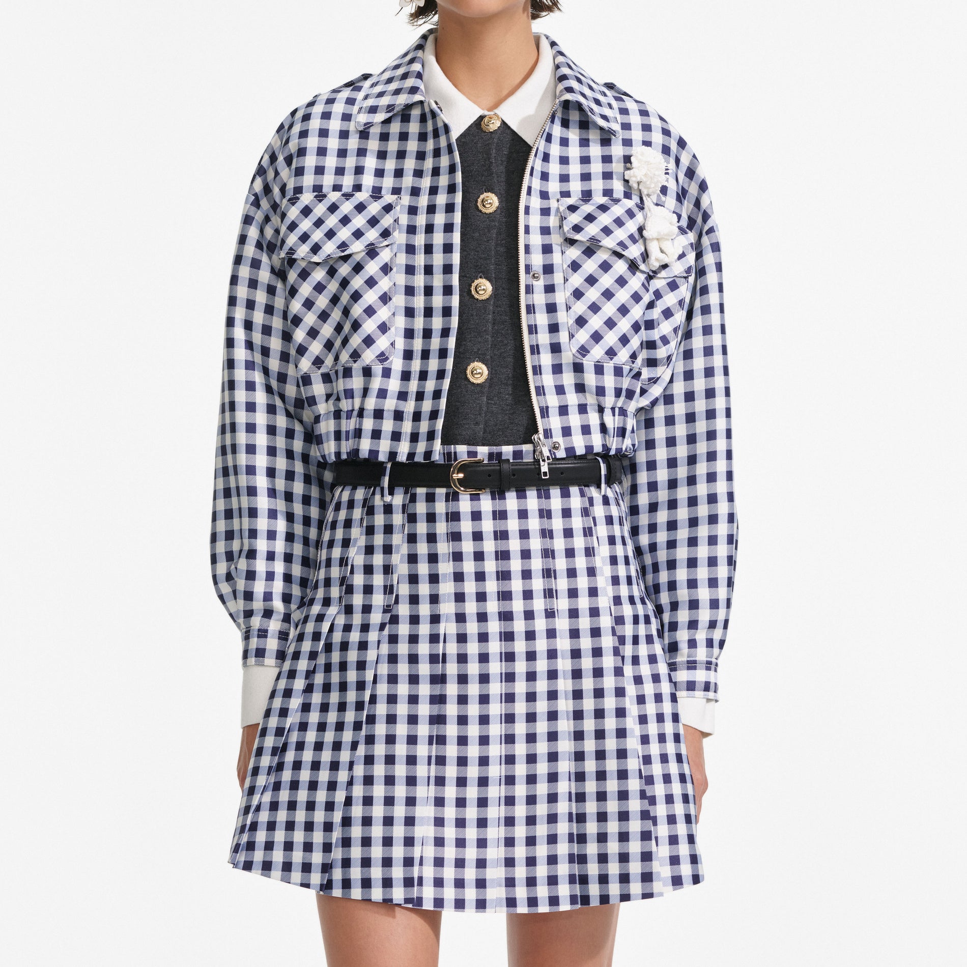 A close up of a woman wearing the Navy Gingham Taffeta Jacket