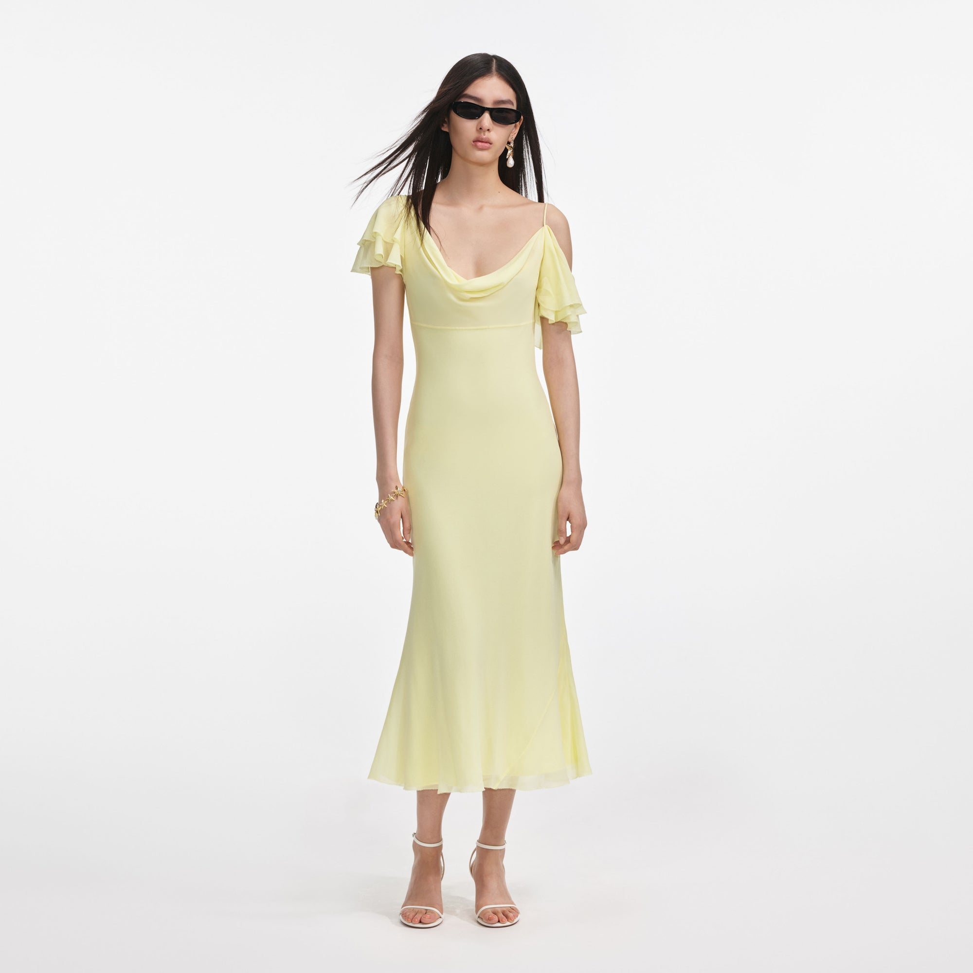 Front view of a woman wearing the Yellow Georgette Frill Midi Dress