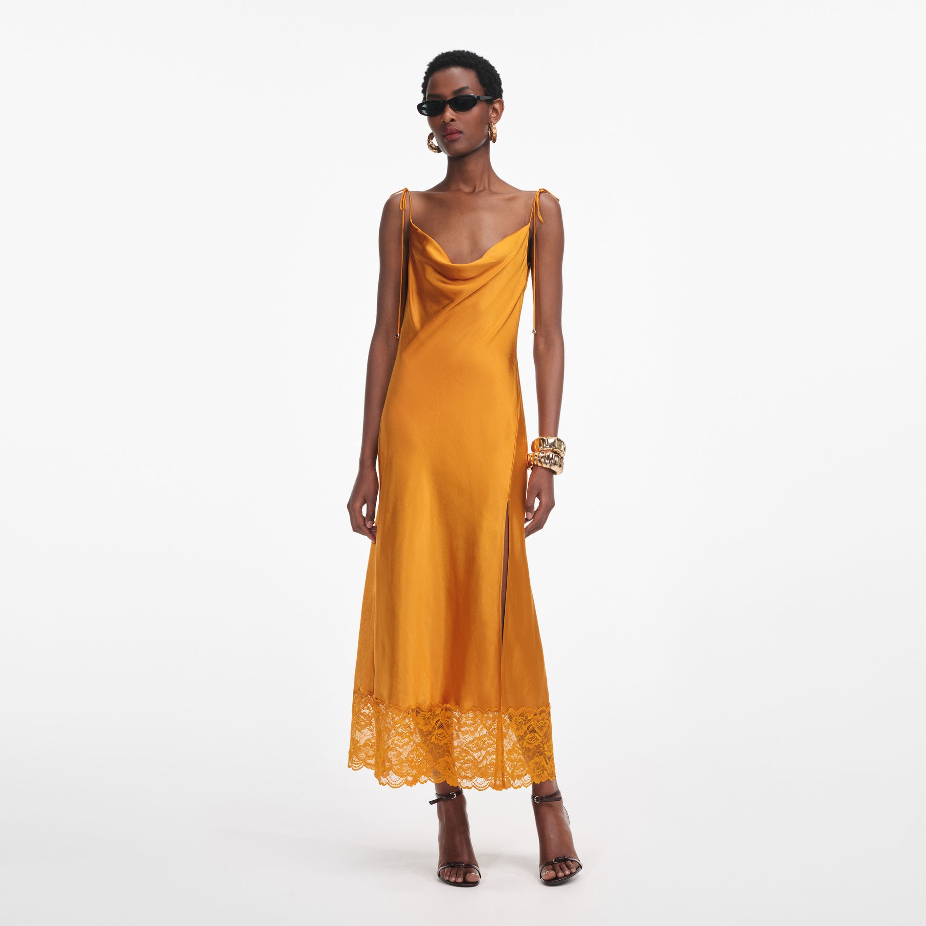 Front view of a woman wearing the Burnt Orange Satin Midi Dress