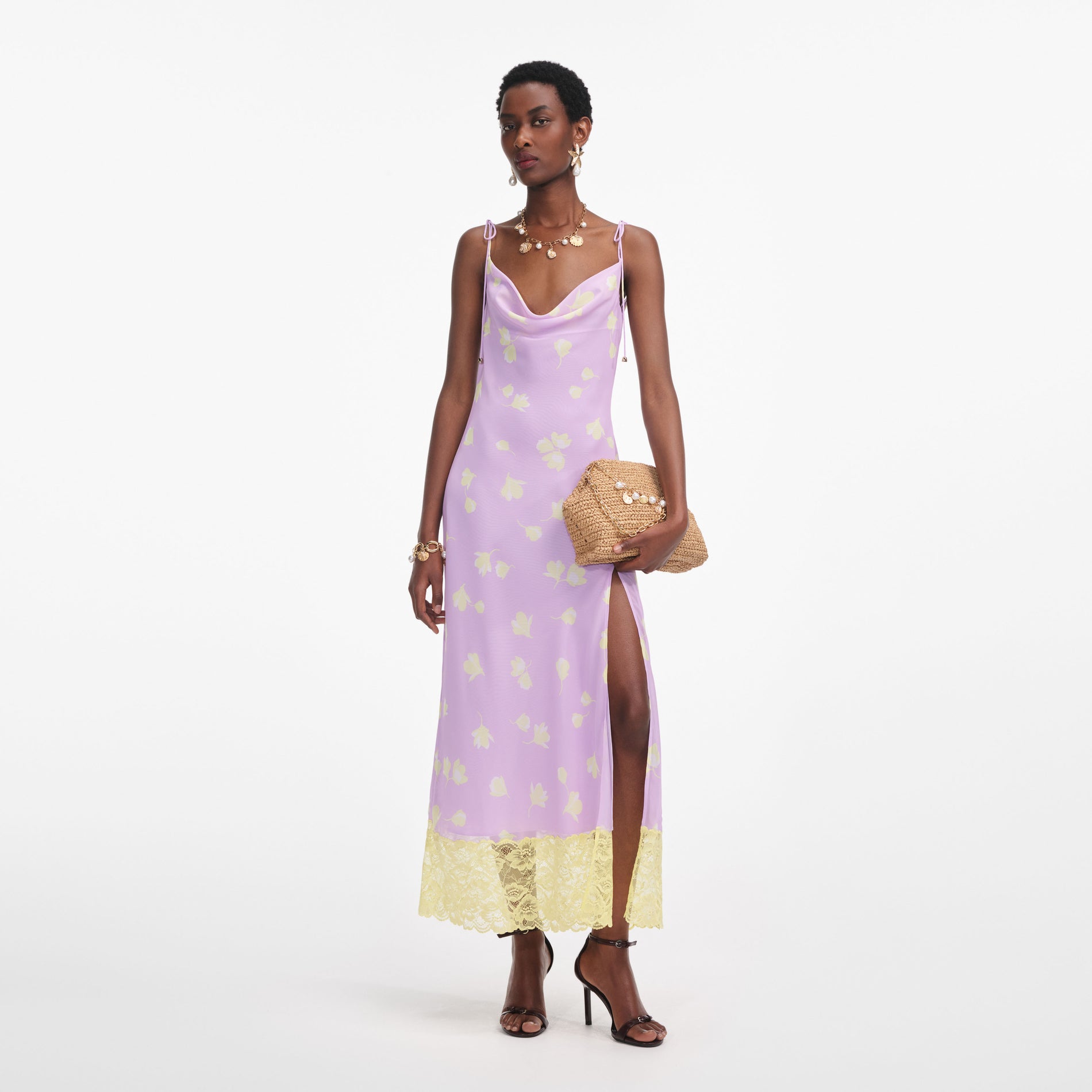 Front view of a woman wearing the Lilac Floral Chiffon Midi Dress