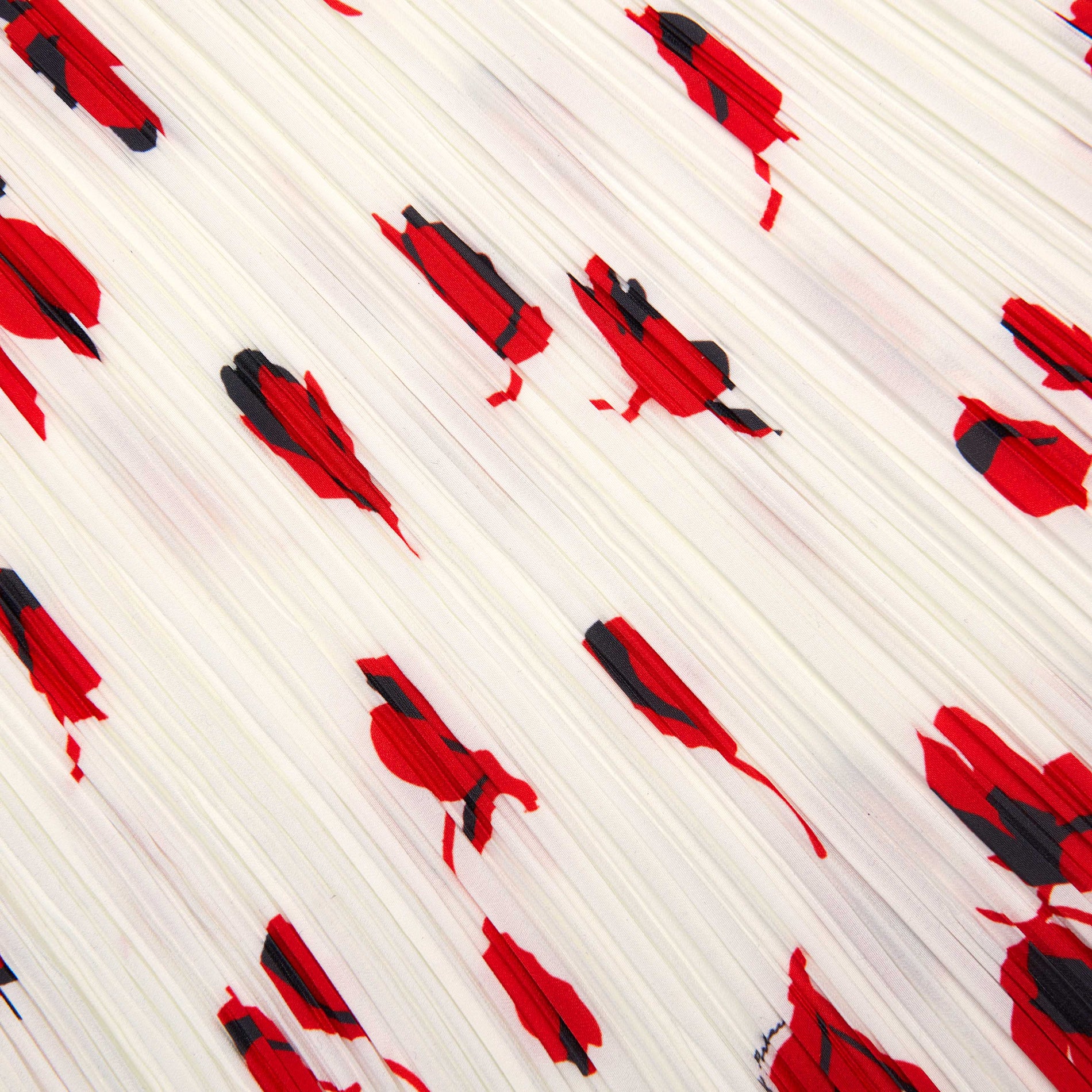 A close up of the fabric for the White Floral Plisse  Midi Skirt
