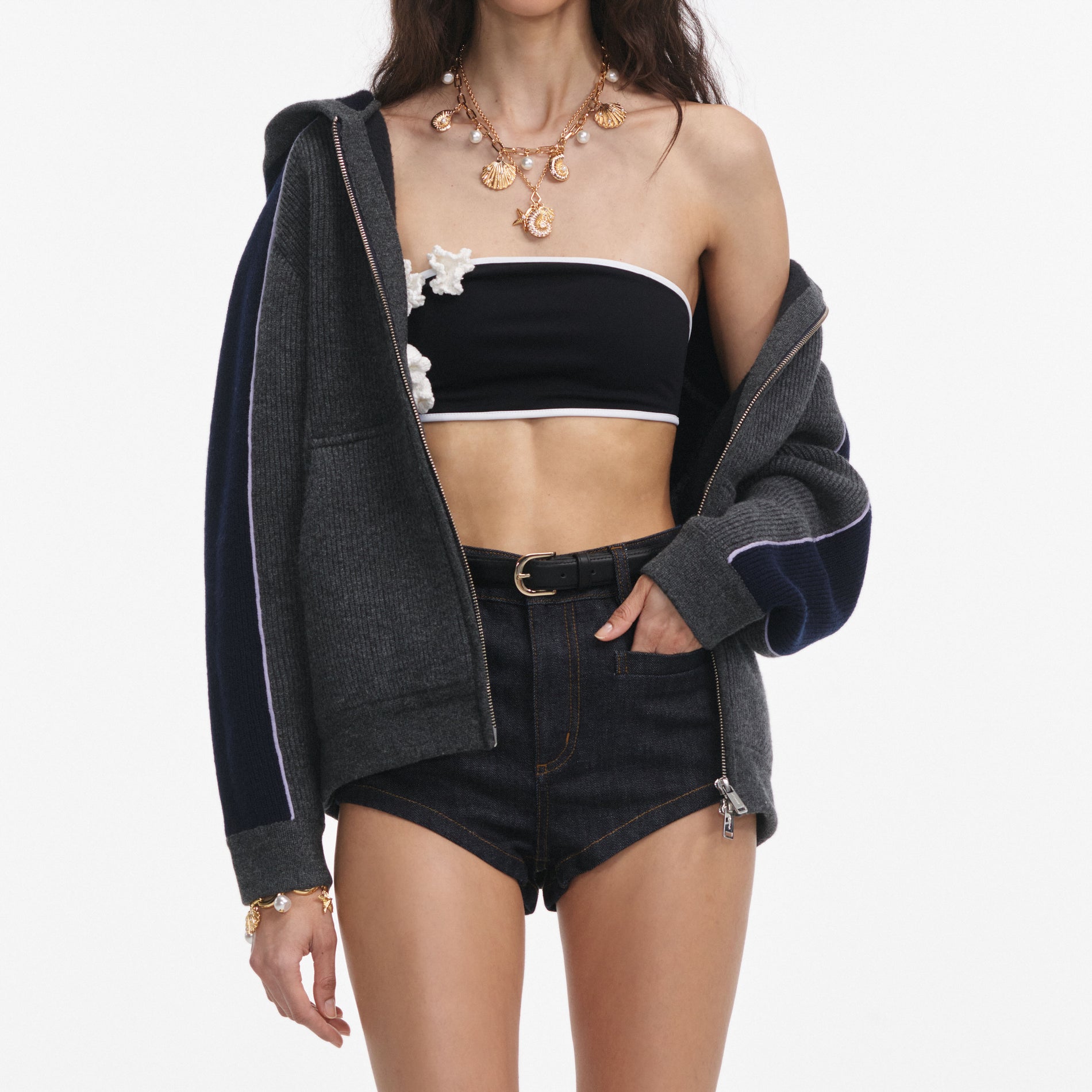 A close up of a woman wearing the Grey Ribbed Knit Hoodie