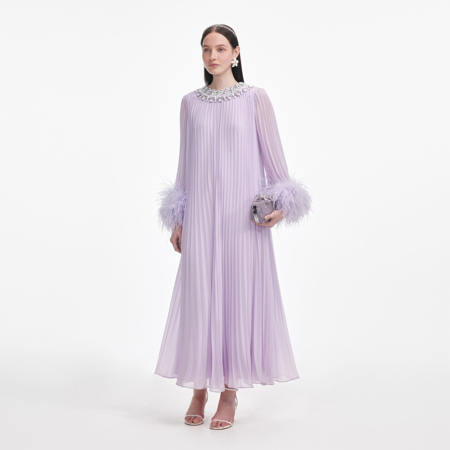 Side view of a woman wearing the Lilac Chiffon Feather Midi Dress