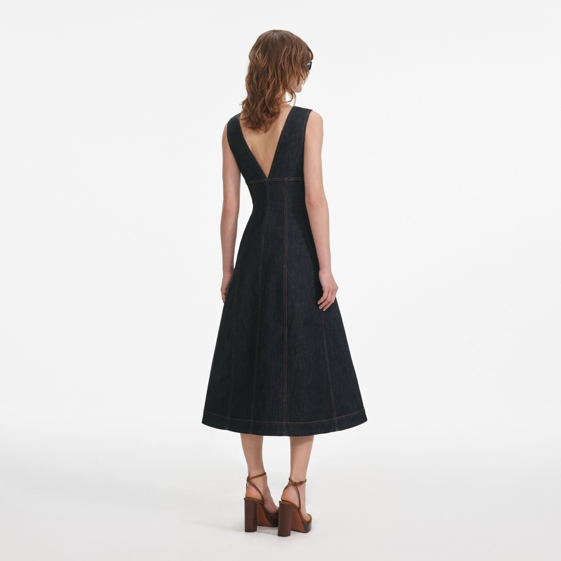 Back view of a woman wearing the Indigo Denim Midi Dress