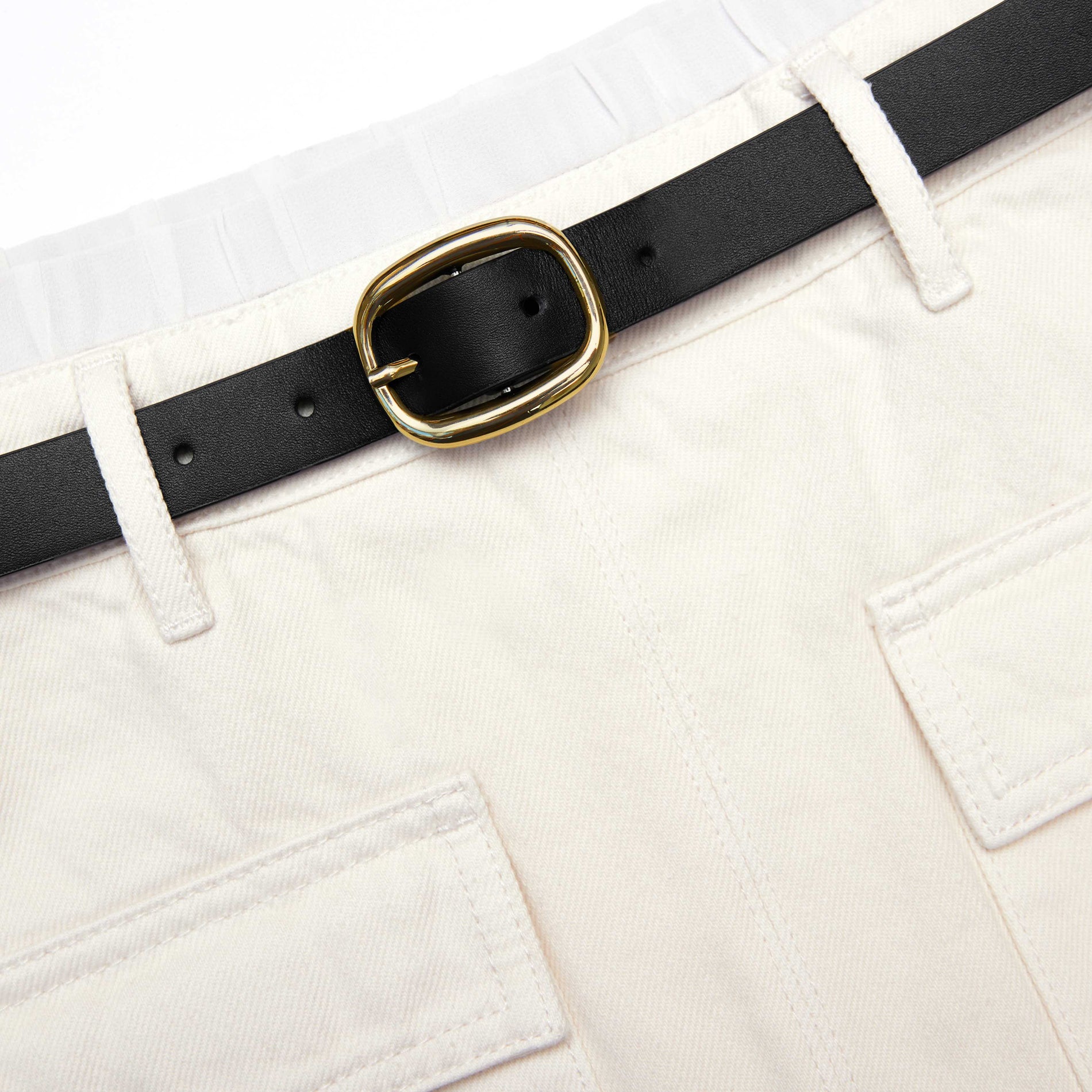 A close up of the fabric for the Cream Denim Midi Skirt