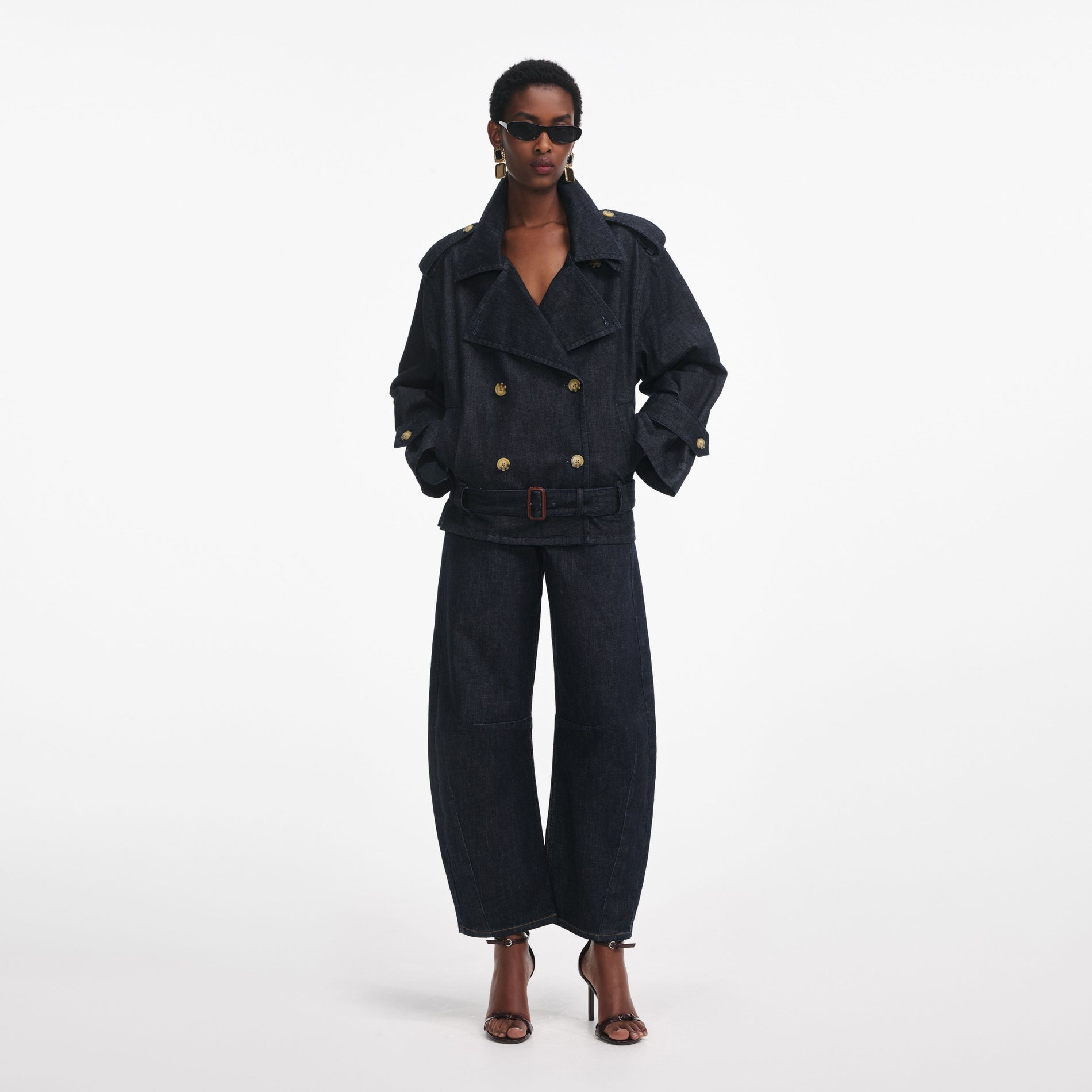 Front view of a woman wearing the Denim Trench Jacket