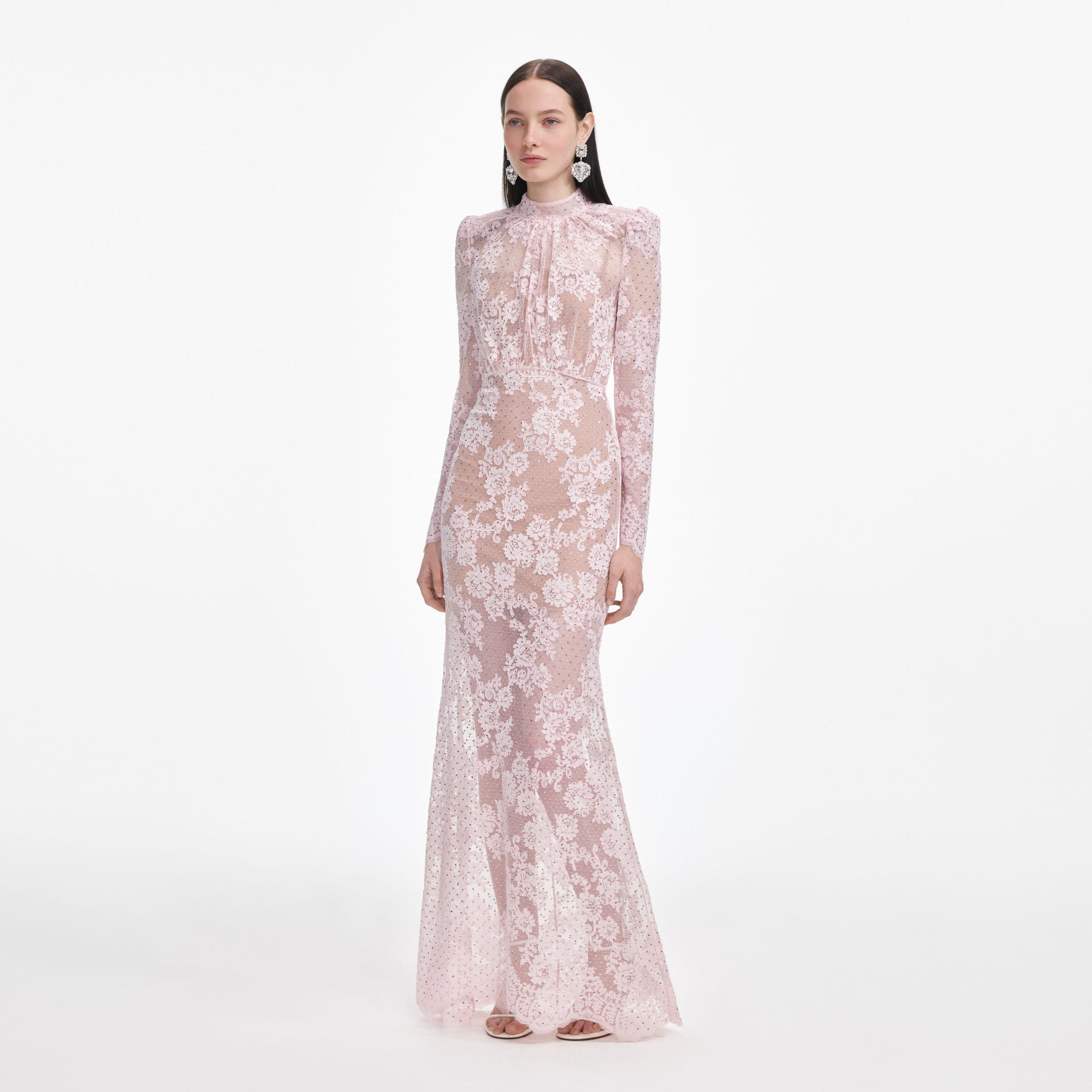 Side view of a woman wearing the Pale Pink Rhinestone Lace Maxi Dress
