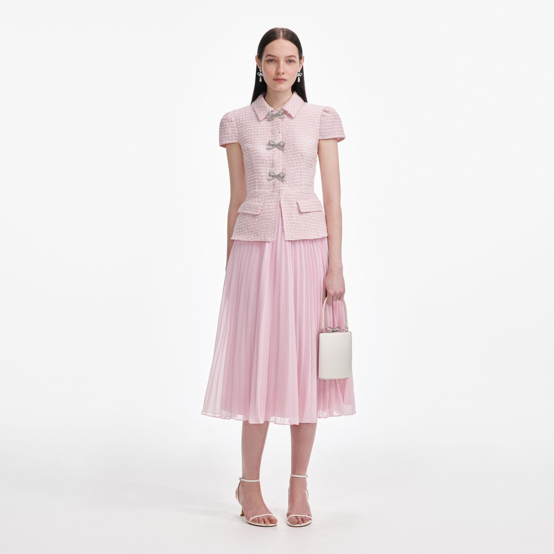 Front view of a woman wearing the Pink Boucle Midi Dress