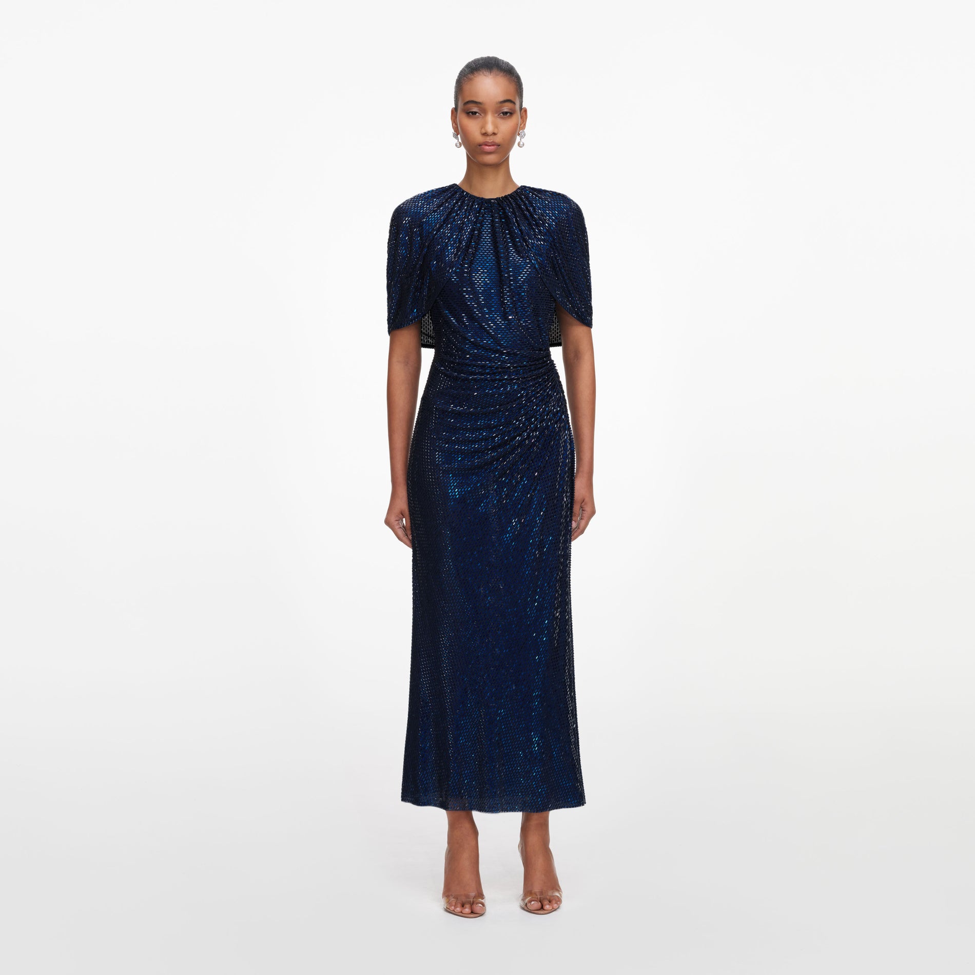 Front view of a woman wearing the Navy Rhinestone Cape Sleeve Midi Dress