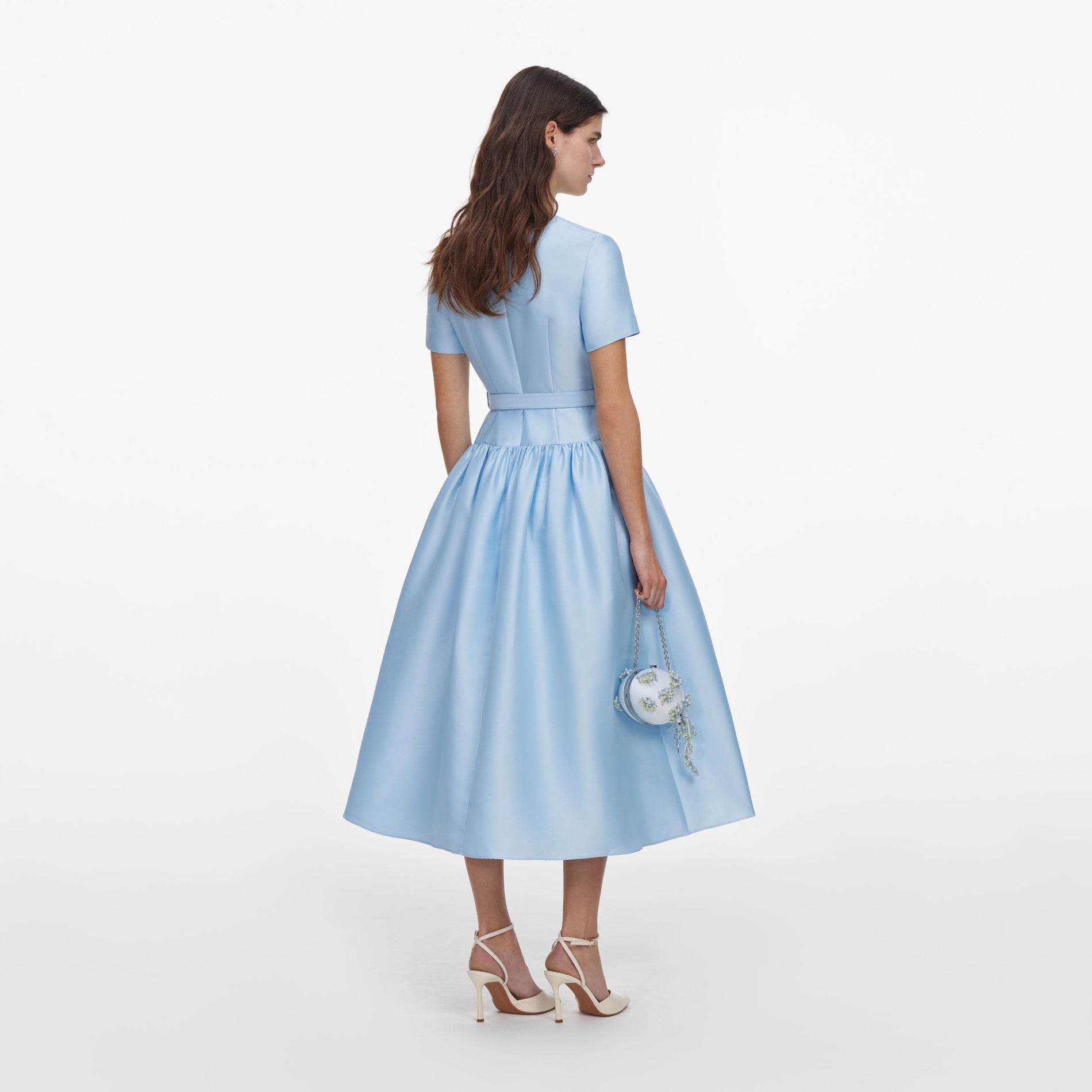 Back view of a woman wearing the Blue Button Front Taffeta Midi Dress