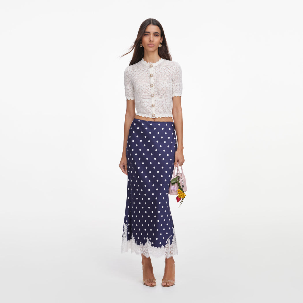 Front view of a woman wearing the White Pointelle Knit Top