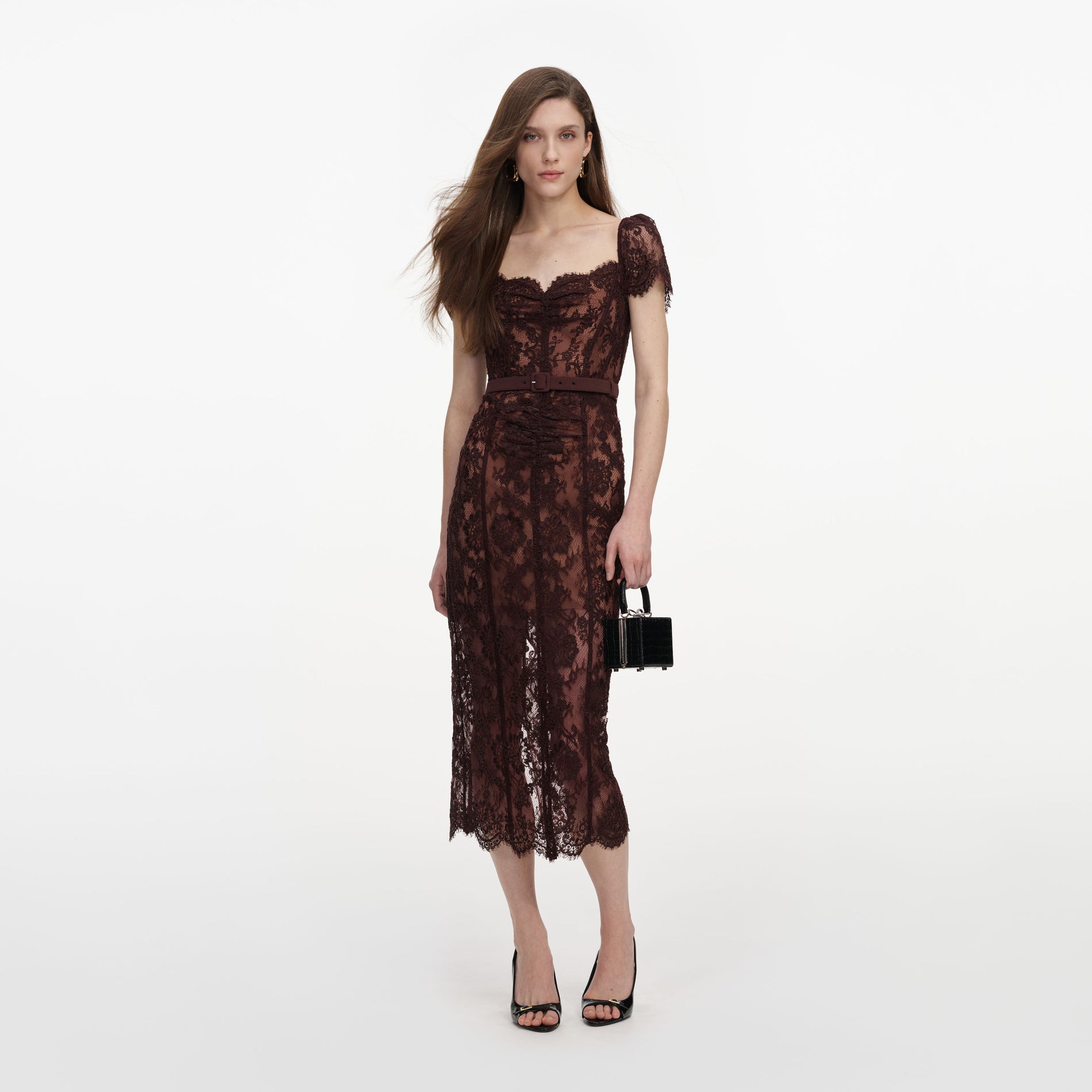 Front view of a woman wearing the Brown Floral Lace Midi Dress