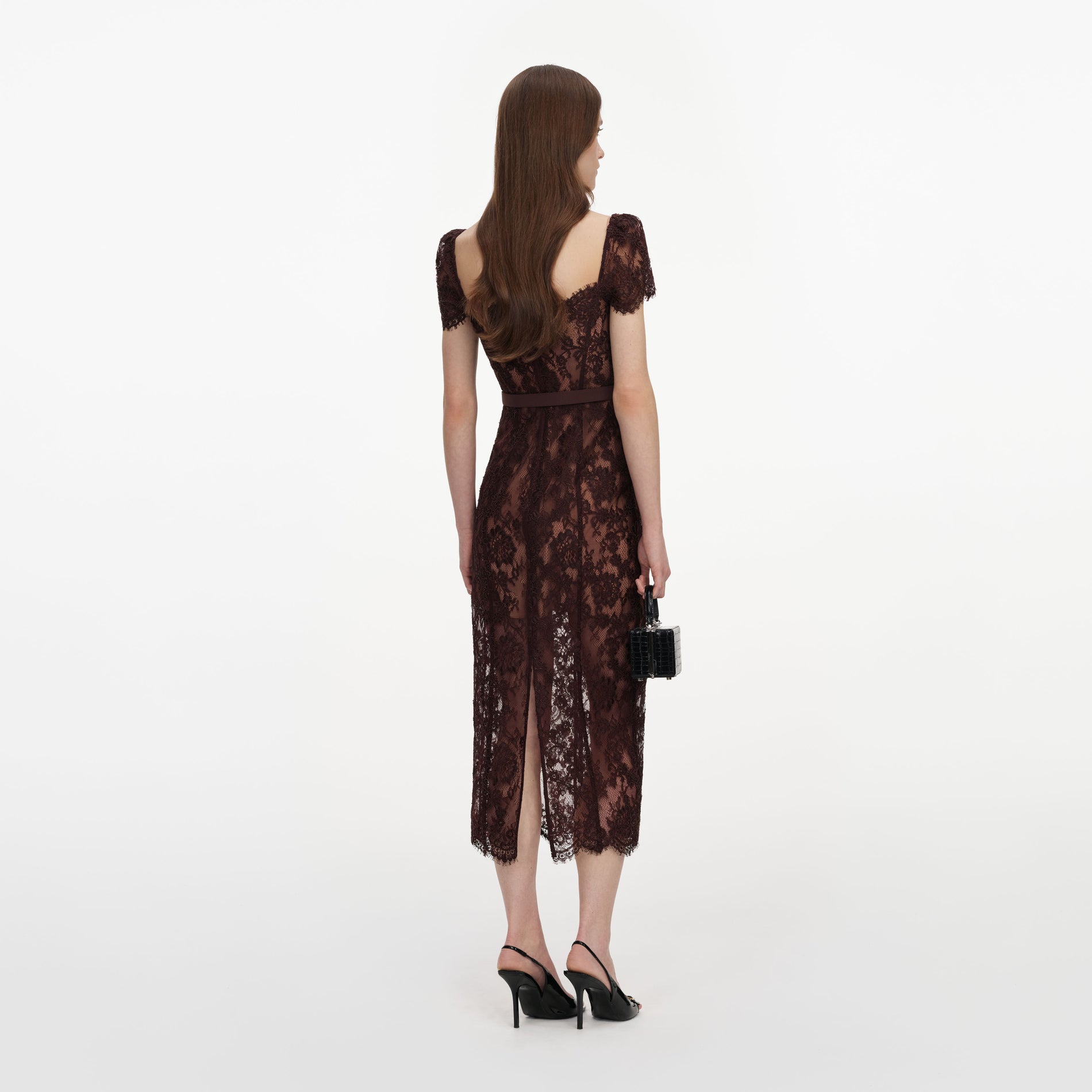 Back view of a woman wearing the Brown Floral Lace Midi Dress
