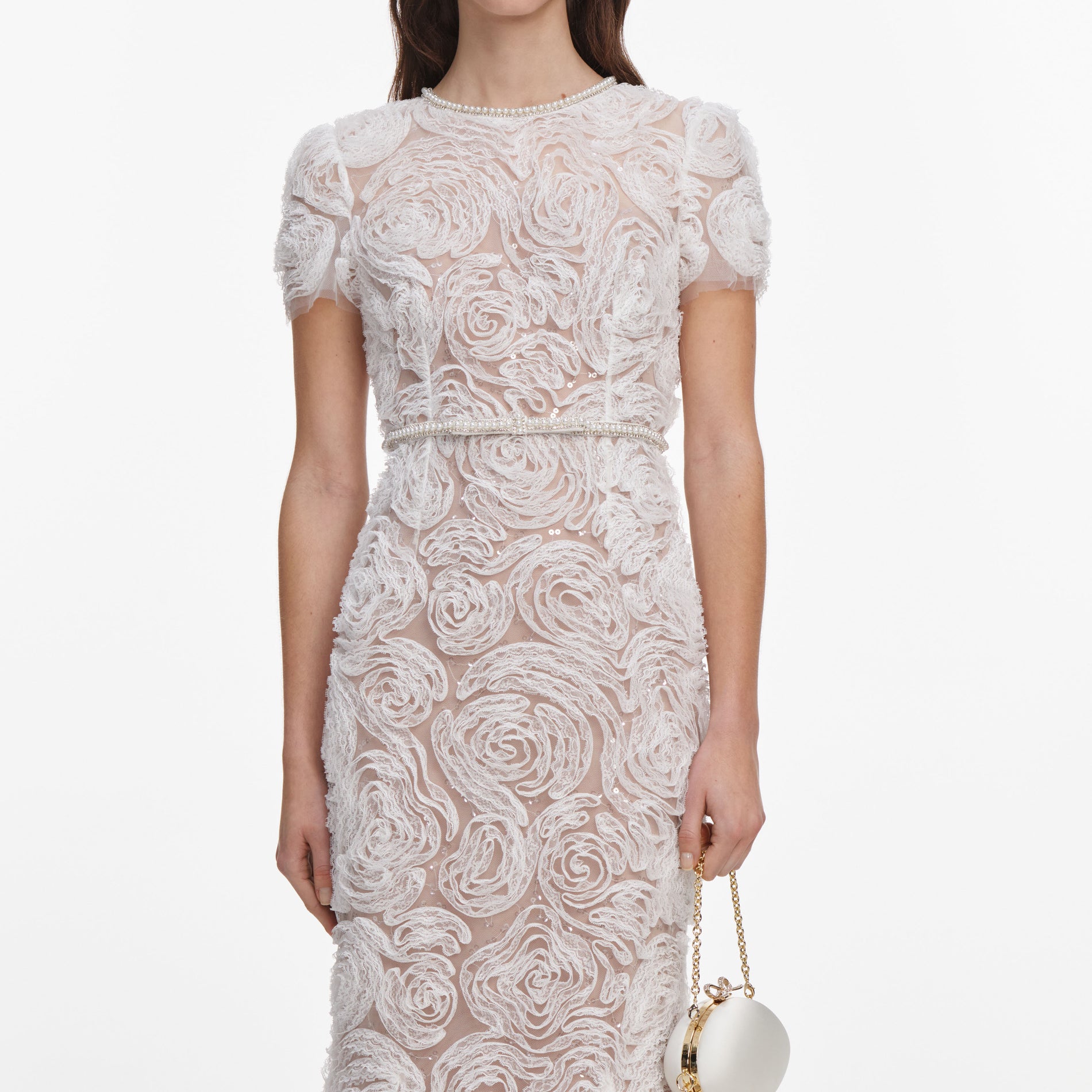 A close up of a woman wearing the White Tulle Lace Maxi Dress