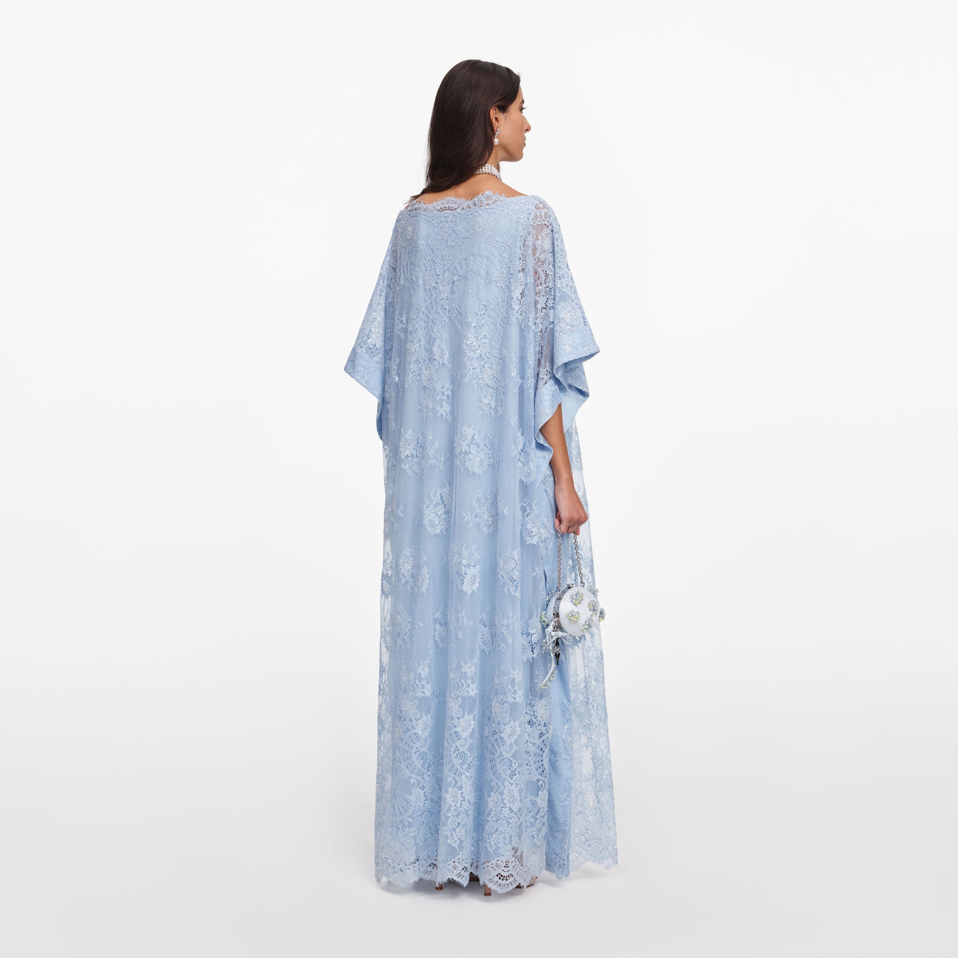 Back view of a woman wearing the Blue Embellished Lace Kaftan
