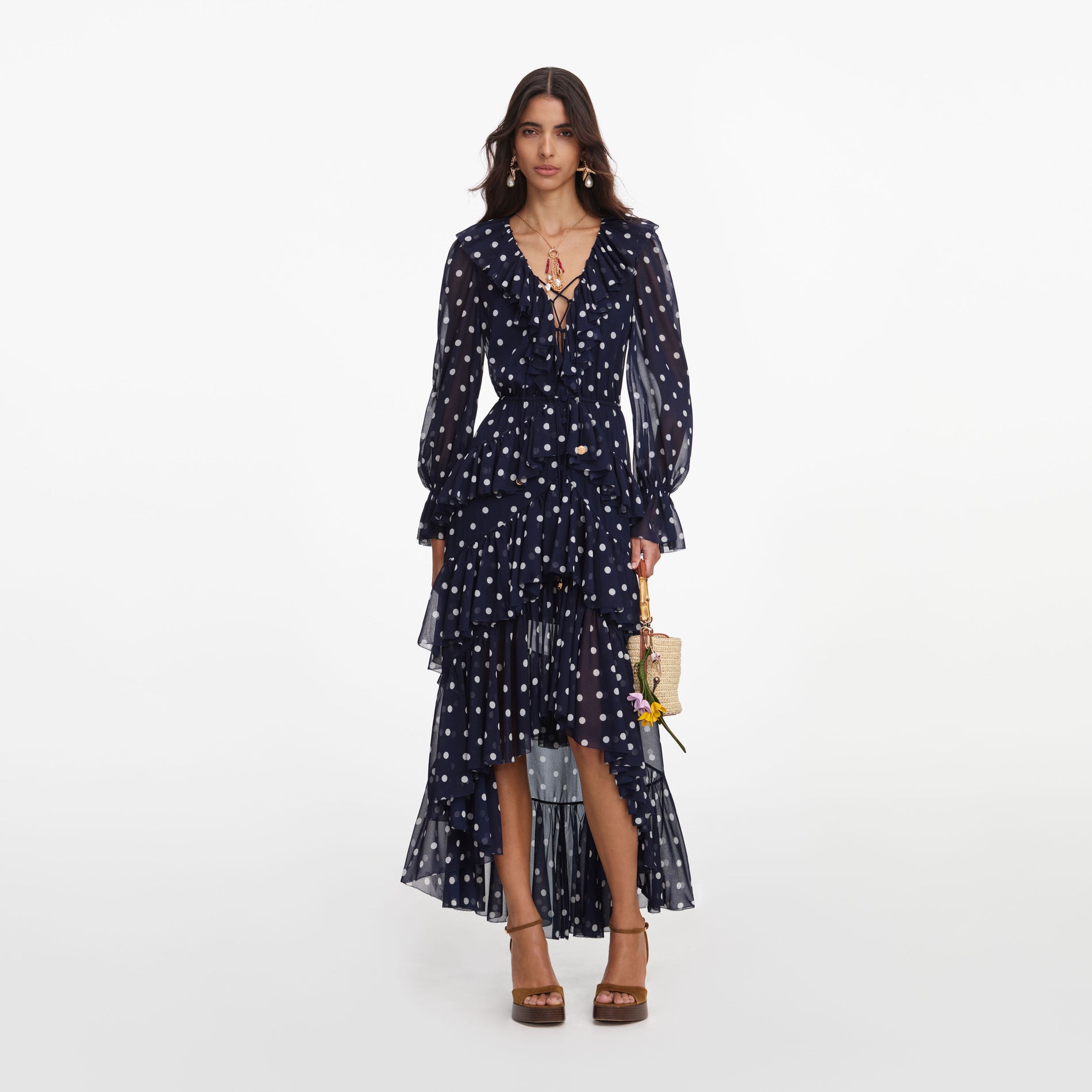 Front view of a woman wearing the Polka Dot Georgette Ruffle Maxi Dress