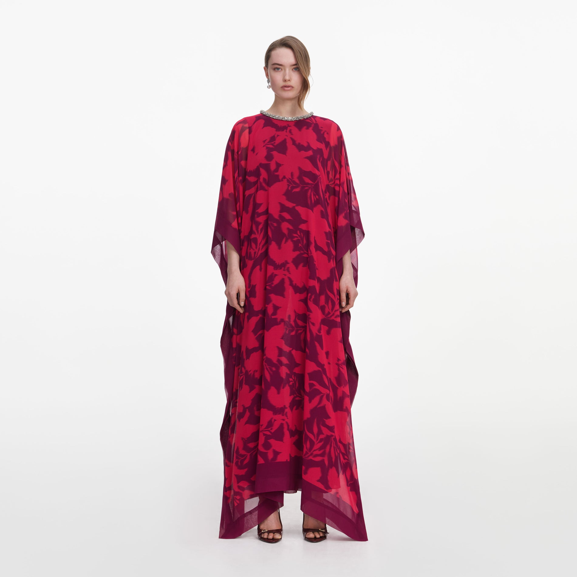 Front view of a woman wearing the Pink Floral Kaftan