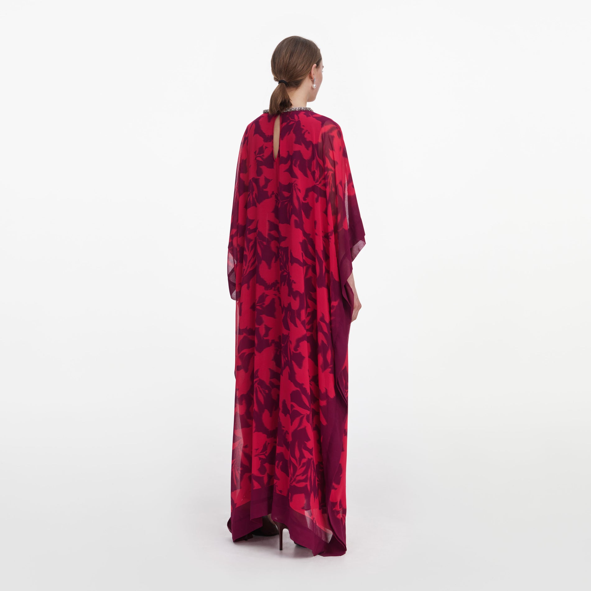 Back view of a woman wearing the Pink Floral Kaftan