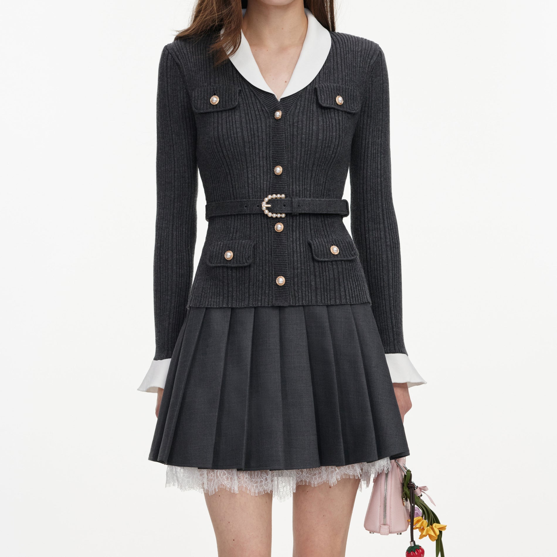 A close up of a woman wearing the Grey Ribbed Knit Cardigan