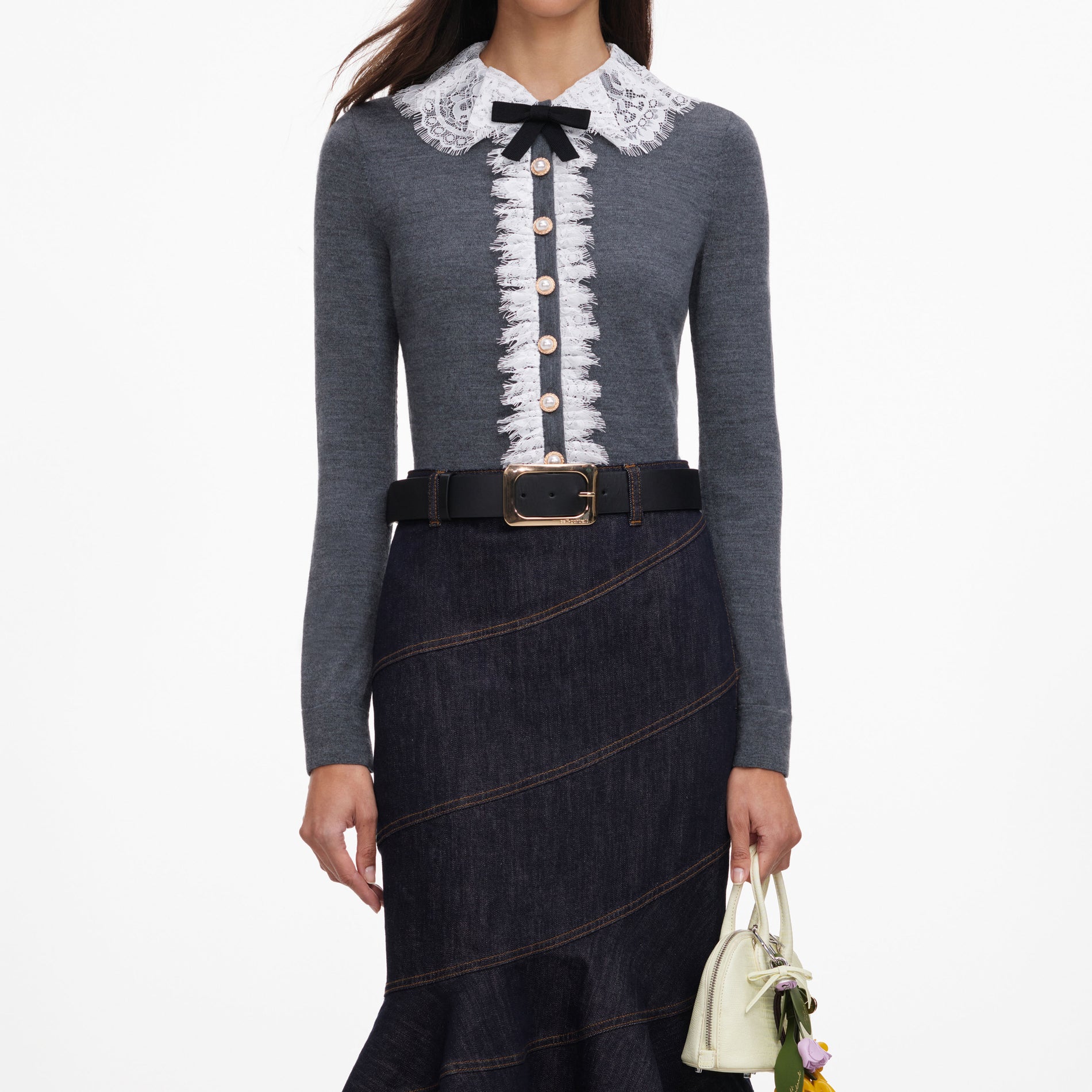 A close up of a woman wearing the Grey Lace Collar Knit Cardigan