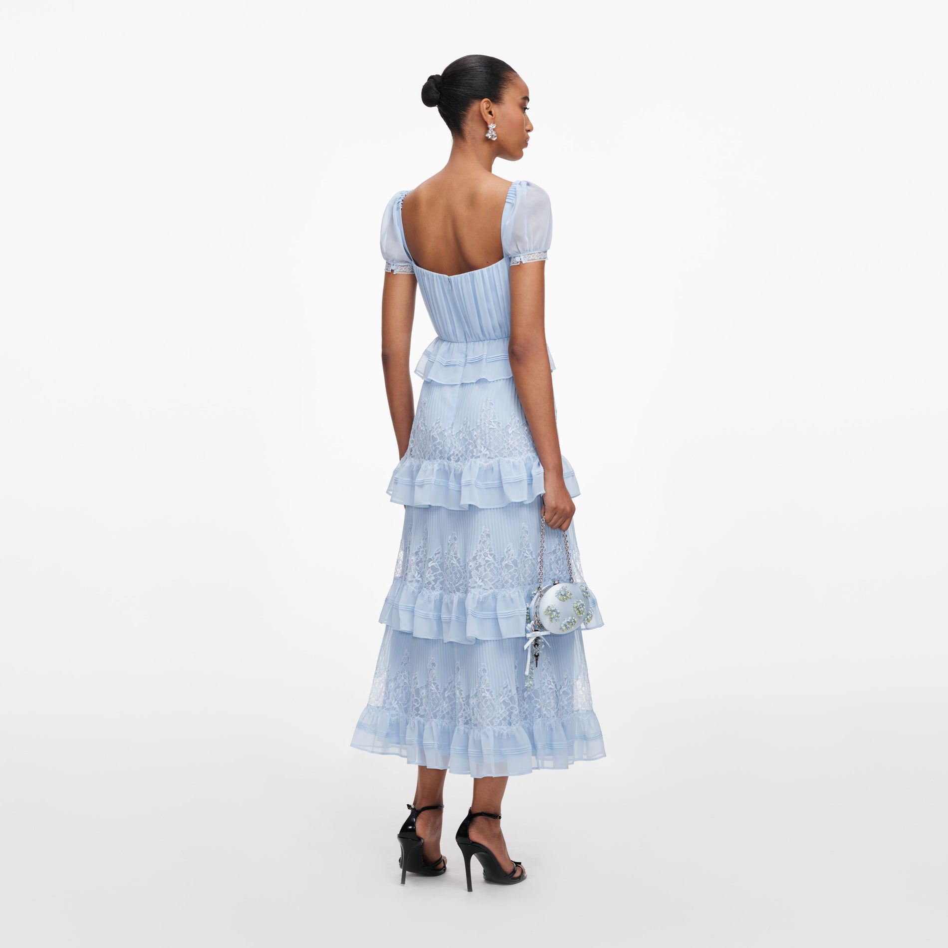 Back view of a woman wearing the Blue Chiffon Short Sleeve Midi Dress