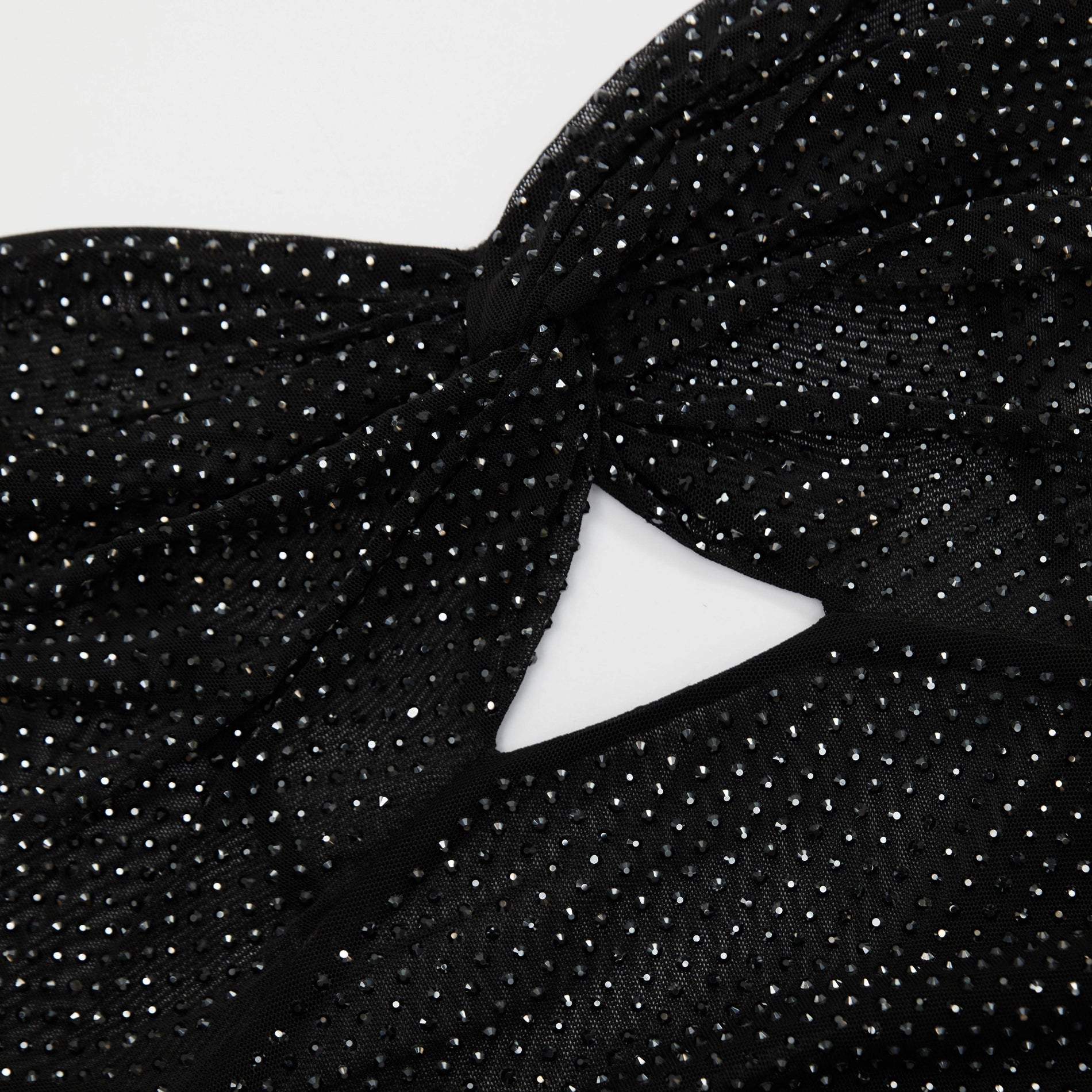 A close up of a woman wearing the Black Rhinestone Sweetheart Mesh Top