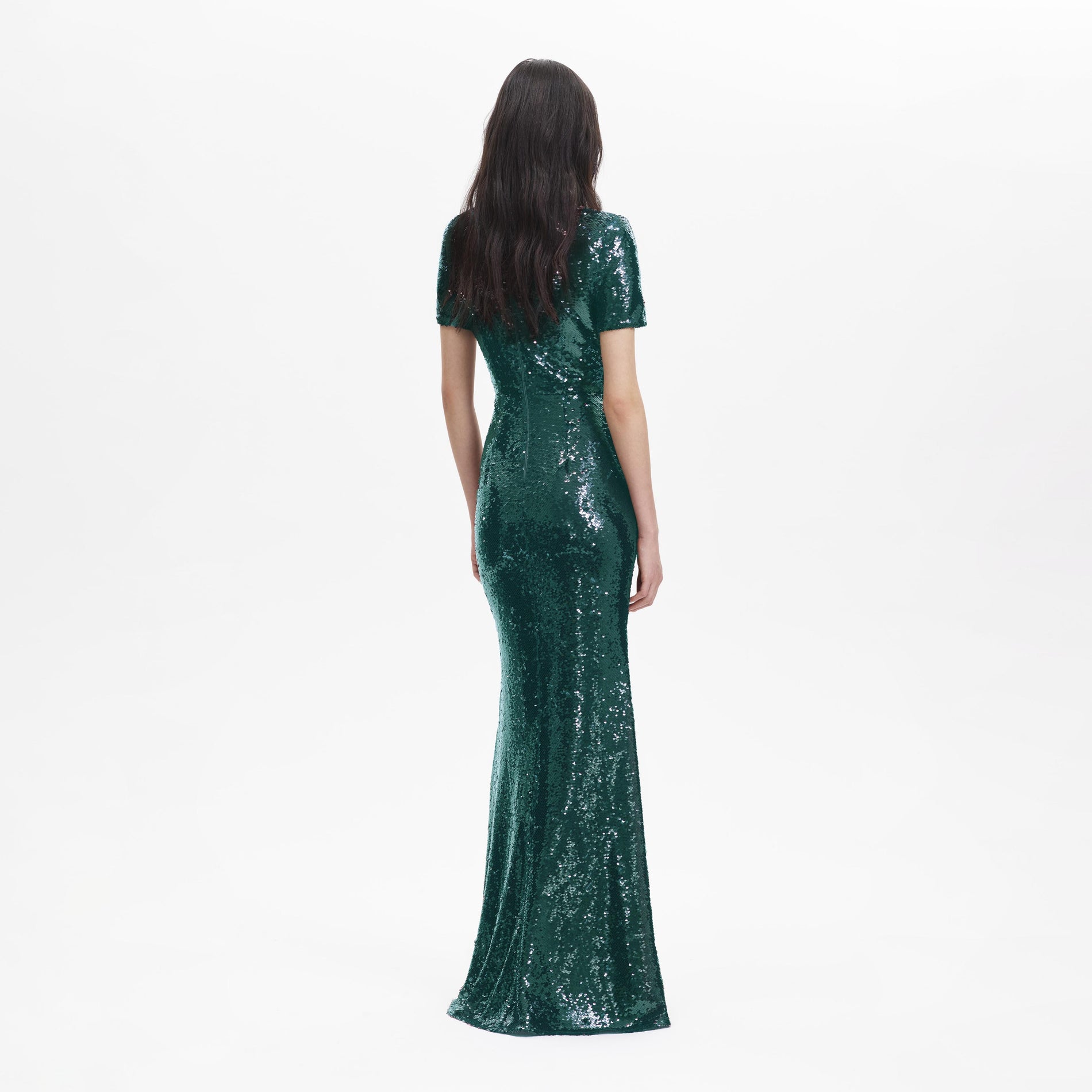 Back view of a woman wearing the Teal Sequin Maxi Dress