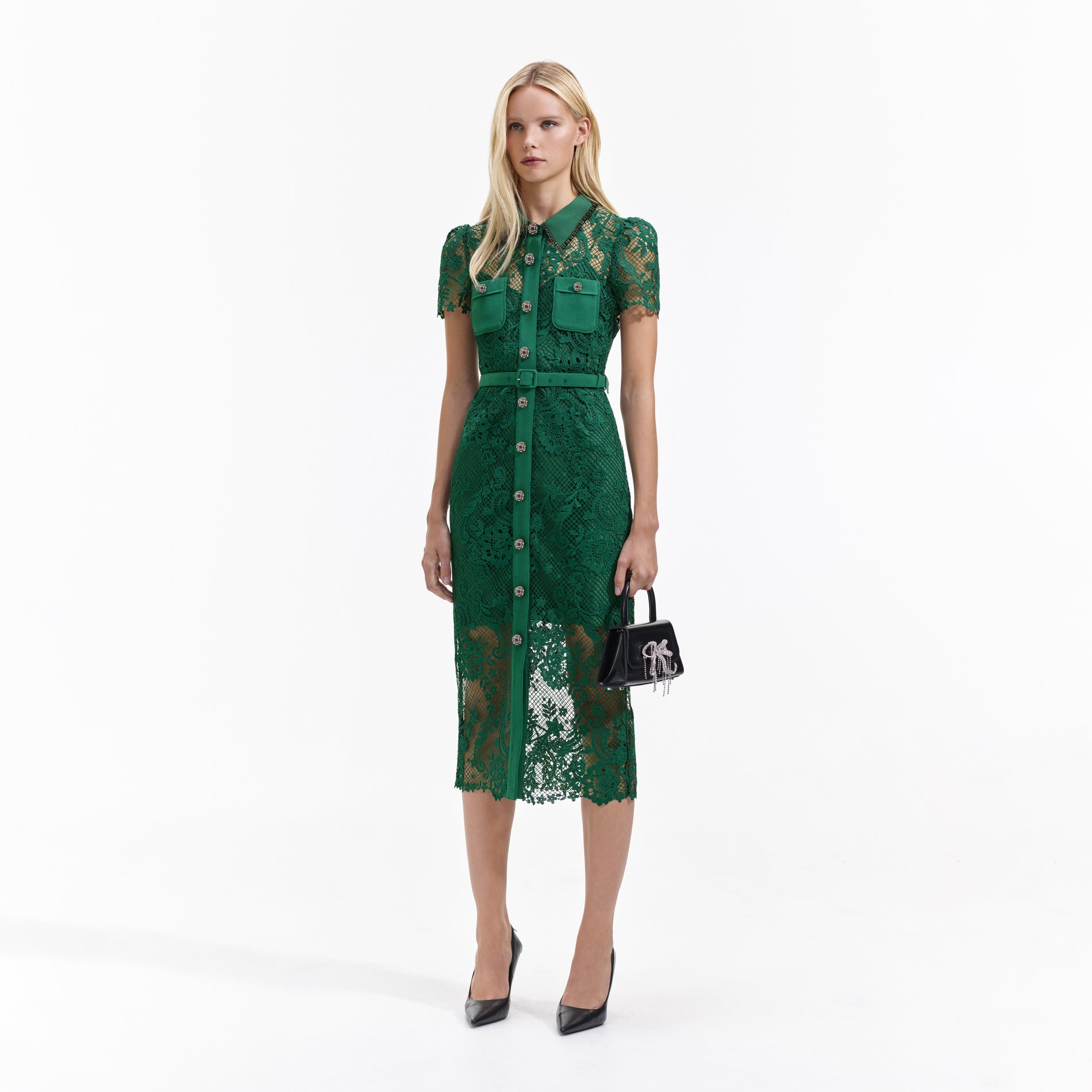 Side view of a woman wearing the Green Lace Button Front Midi Dress