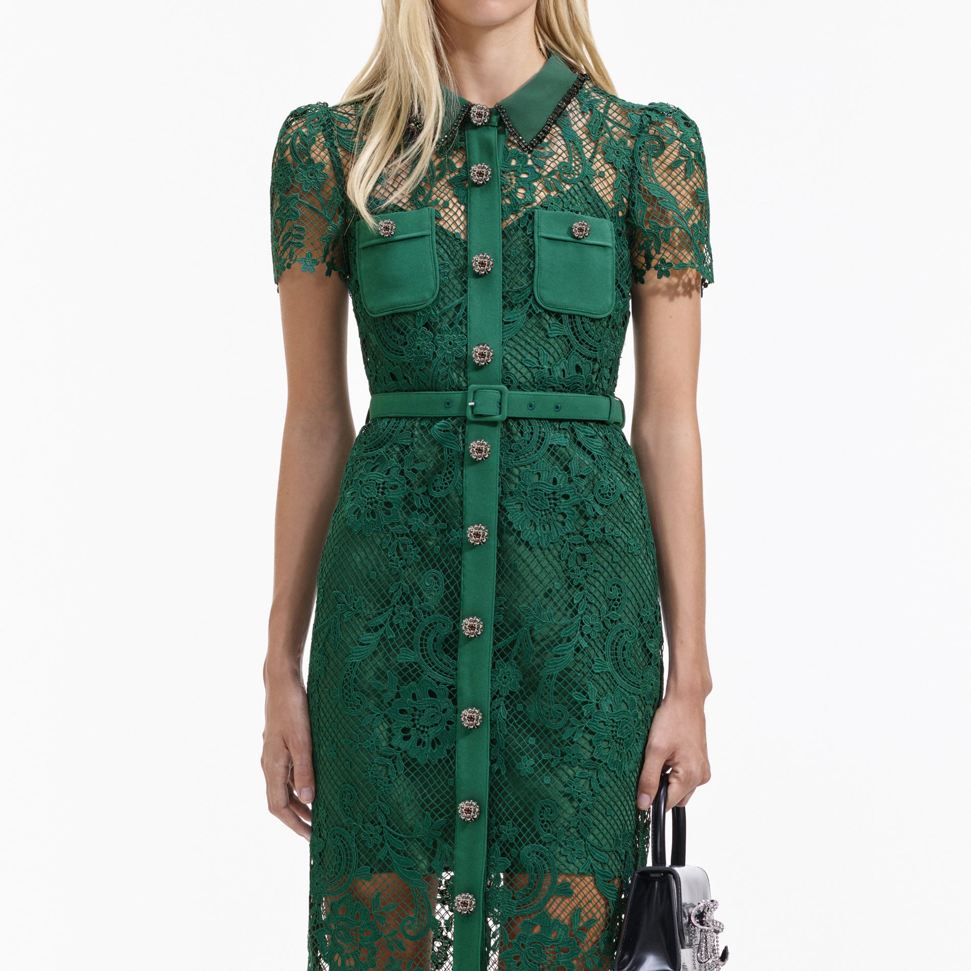 A close up of a woman wearing the Green Lace Button Front Midi Dress
