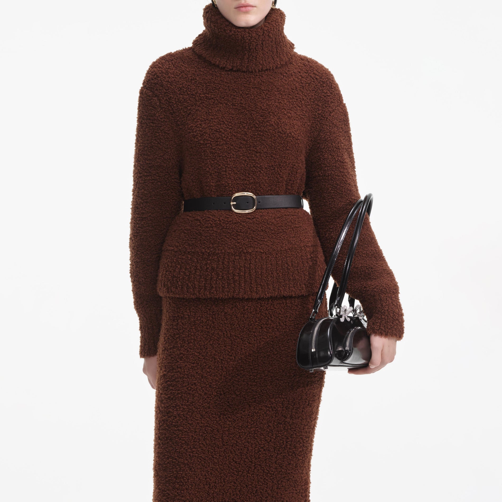 A close up of a woman wearing the Brown Fluffy Knit Midi Skirt