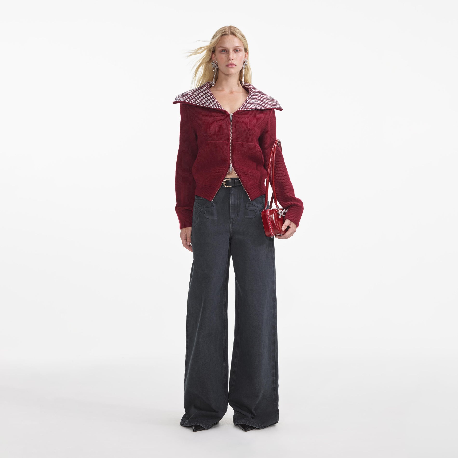 Front view of a woman wearing the Burgundy Diamante Collar Knit Jacket