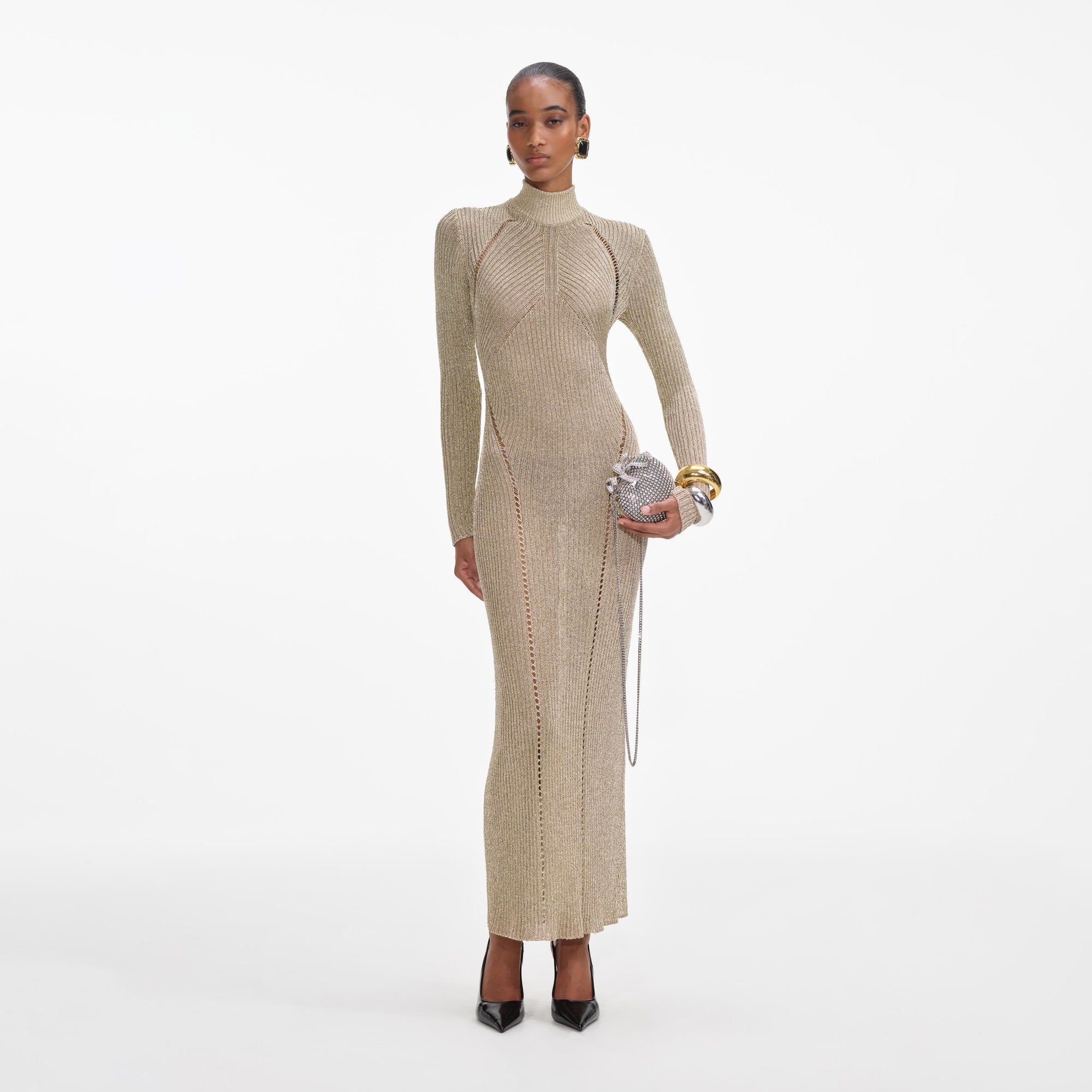 Front view of a woman wearing the Gold Lurex Knit Maxi Dress