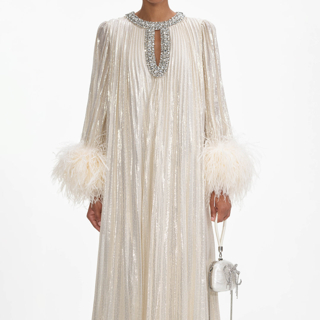 FEATHERED SEQUINED MAXI DRESS IN METALLIC SILVER