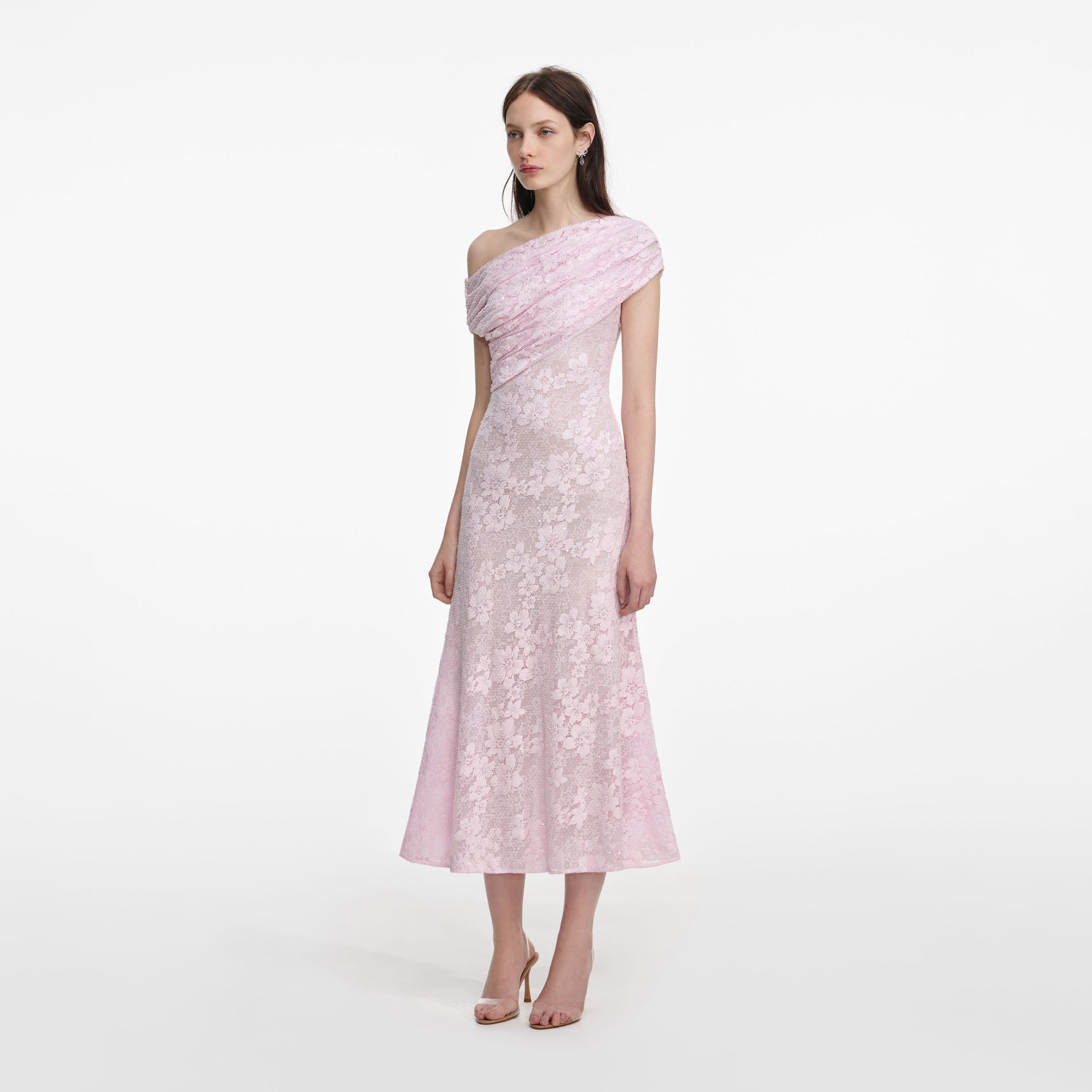 Side view of a woman wearing the Pink Rhinestone Lace Midi Dress