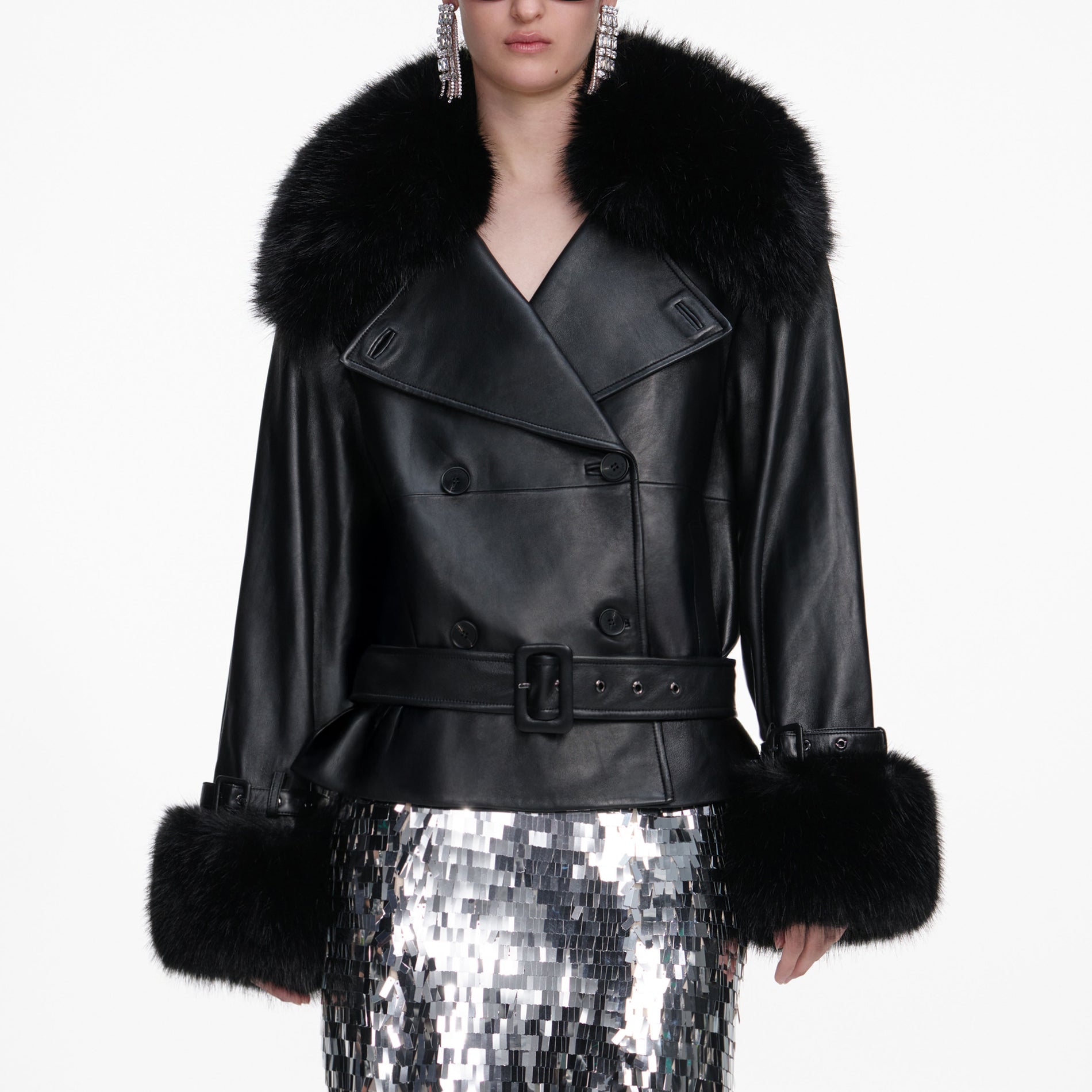 A close up of a woman wearing the Black Belted Leather Jacket