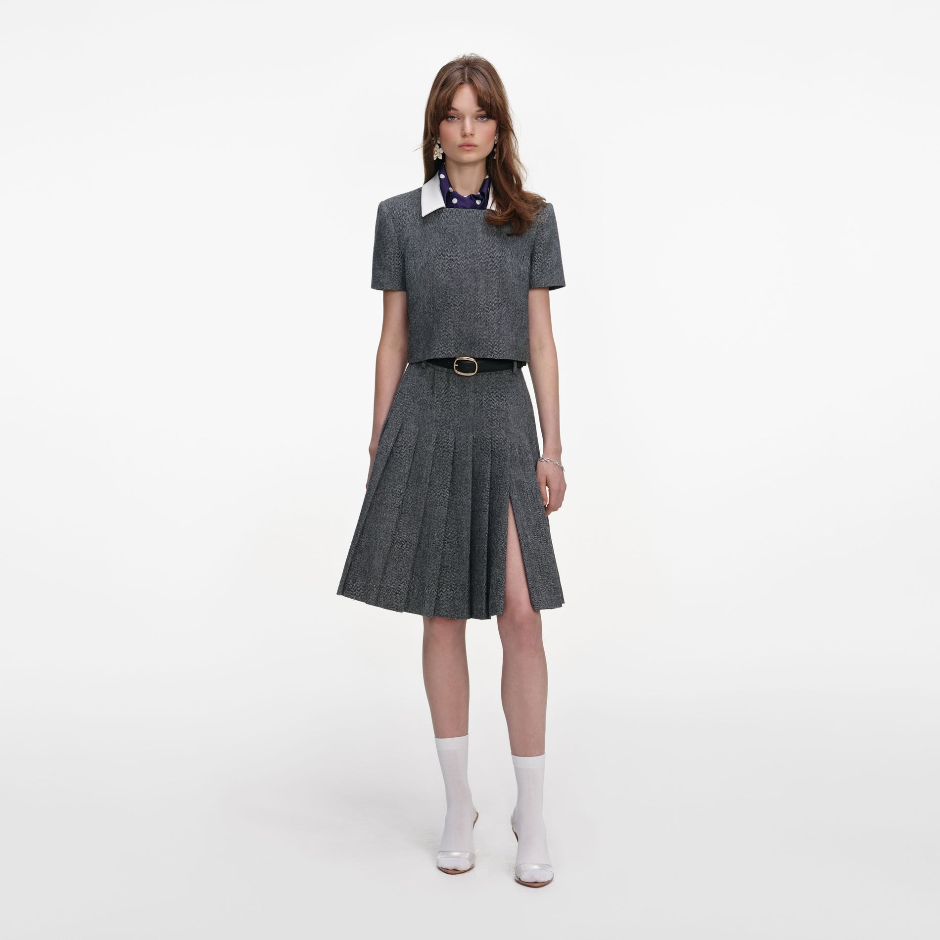 Front view of a woman wearing the Grey Herringbone Scarf Detail Top