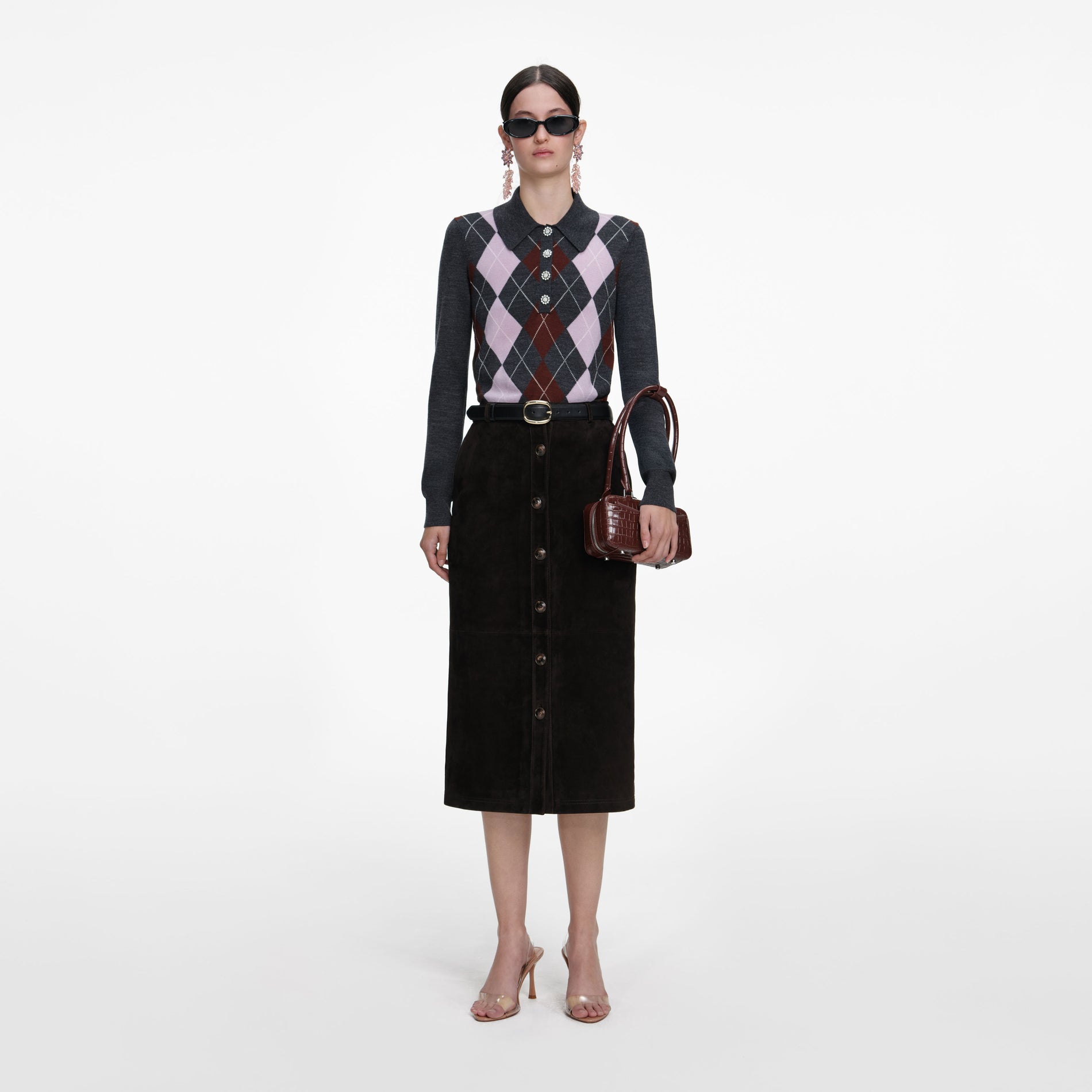 Front view of a woman wearing the Grey Argyle Lightweight Jumper