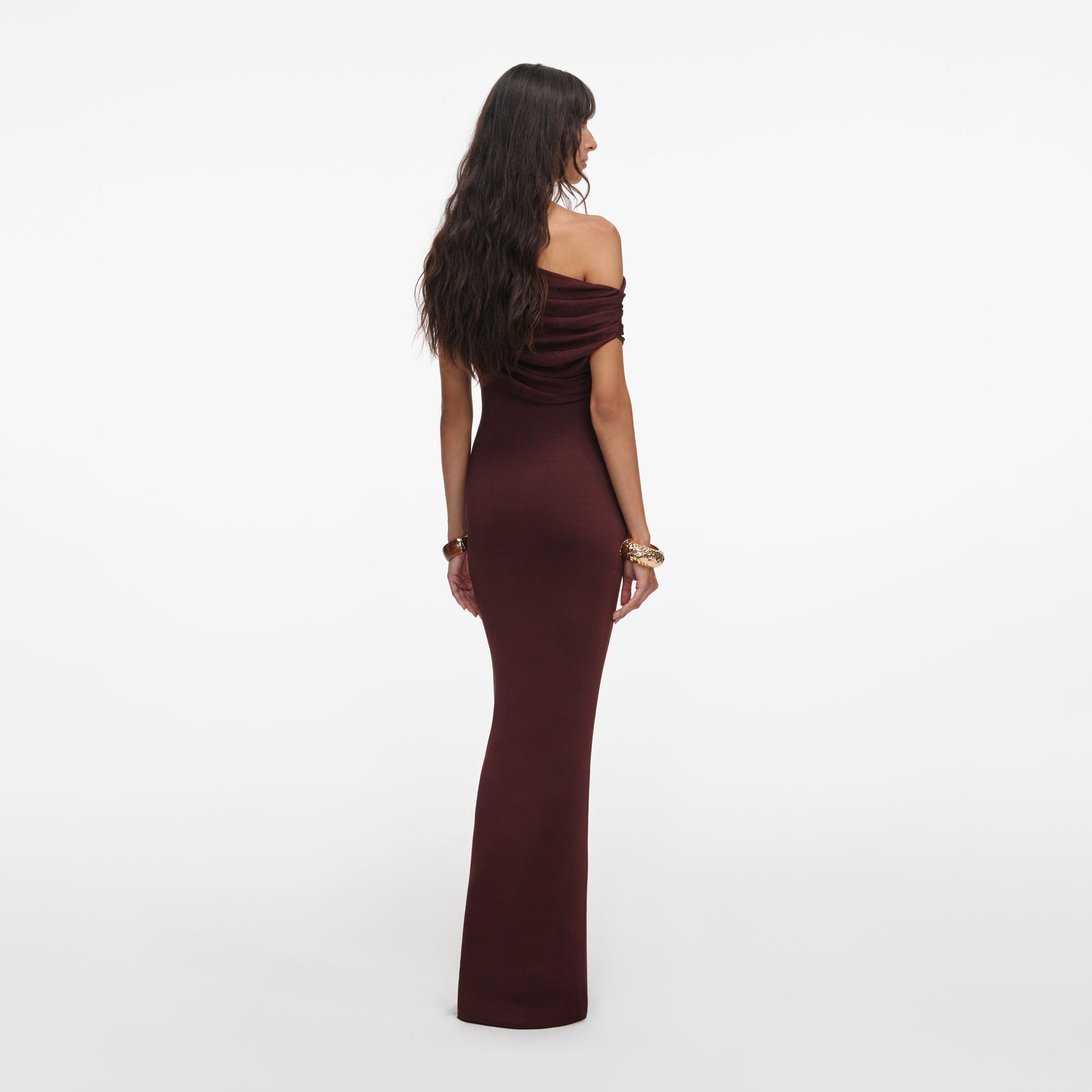 Back view of a woman wearing the Brown Draped Knit Midi Dress