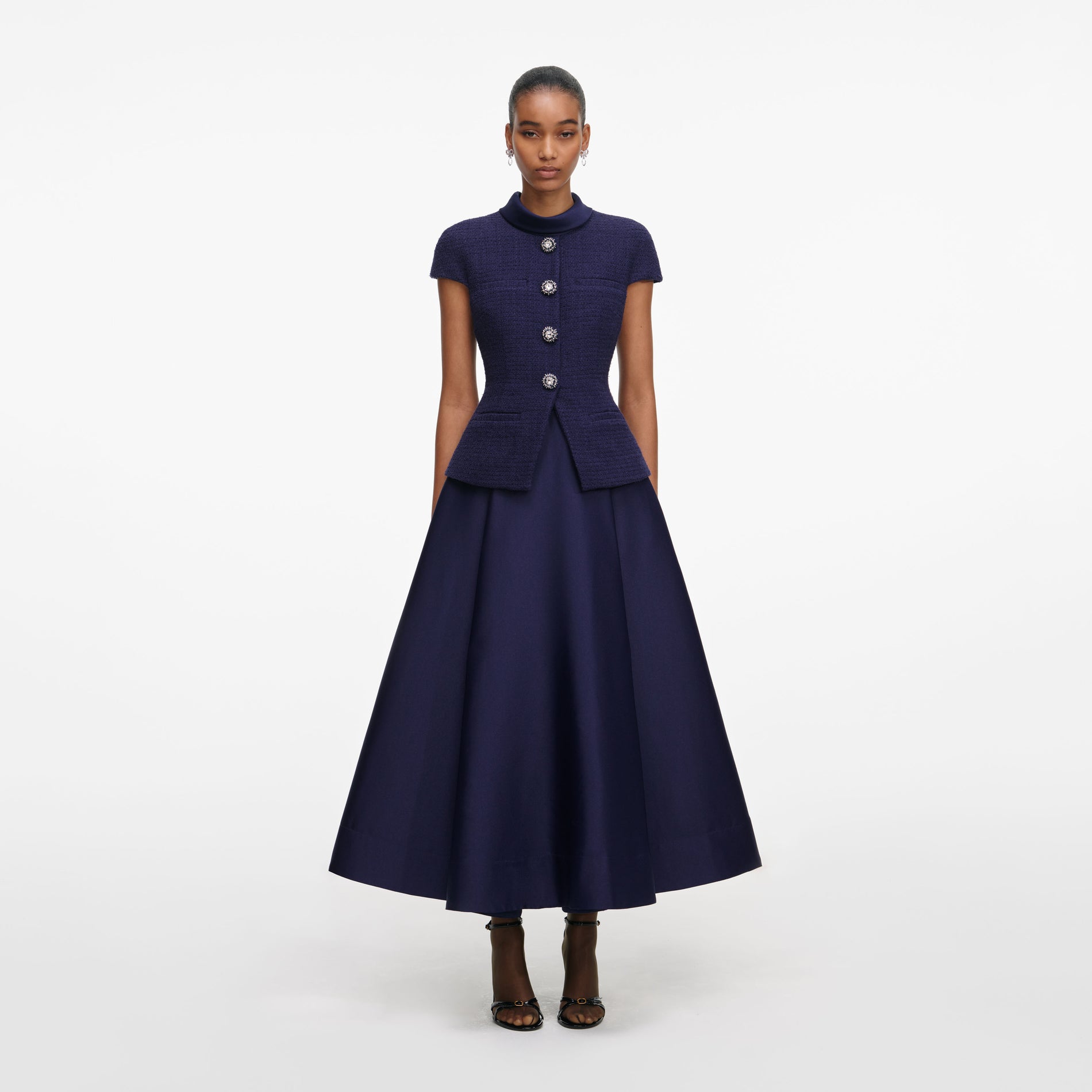 Front view of a woman wearing the Navy Boucle Taffeta Midi Dress