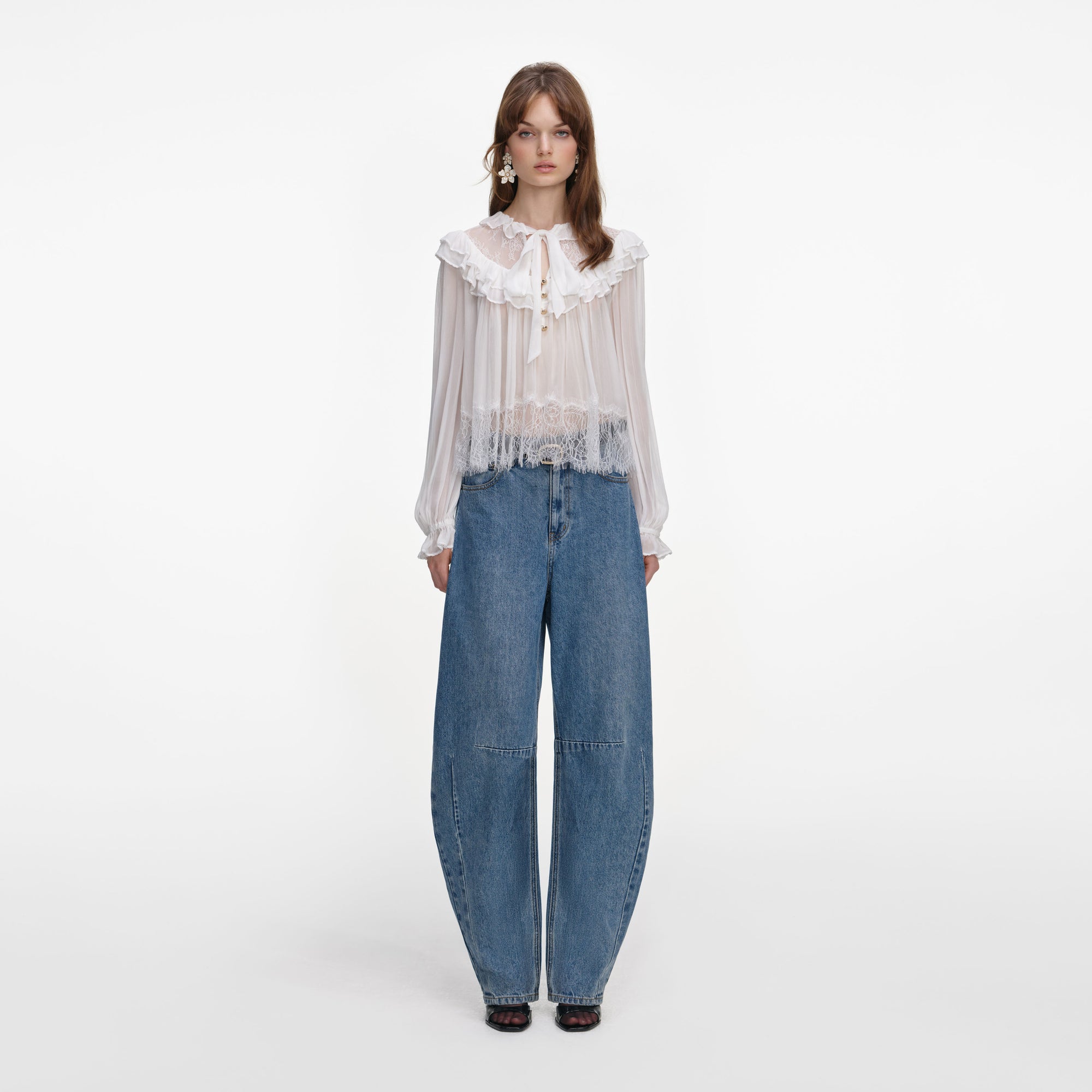 Front view of a woman wearing the White Georgette Lace Blouse