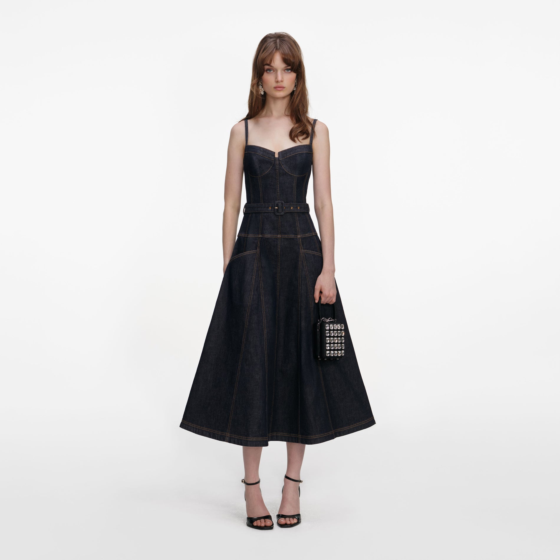 Front view of a woman wearing the Indigo Denim Flared Midi Dress