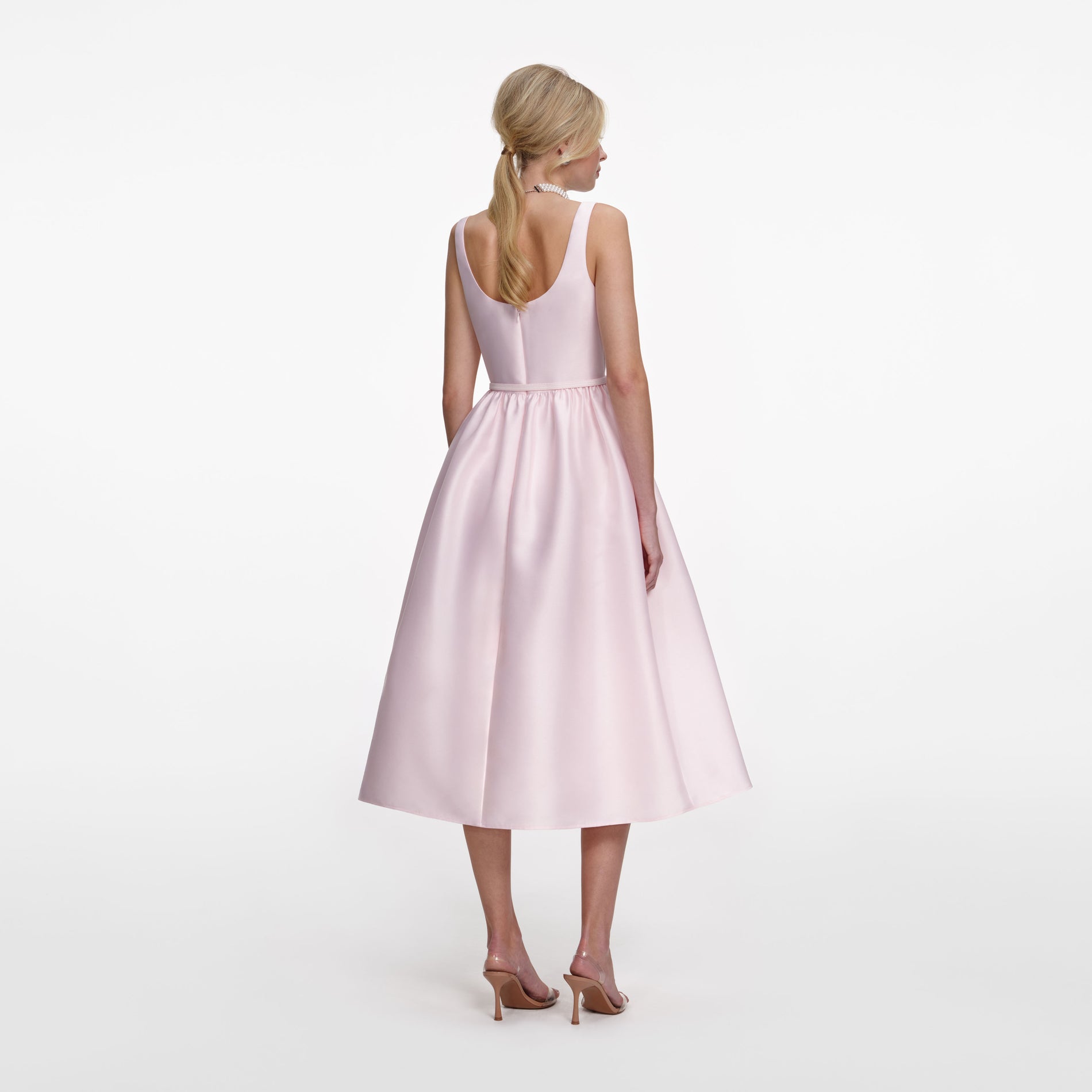 Back view of a woman wearing the Pink Taffeta Midi Dress