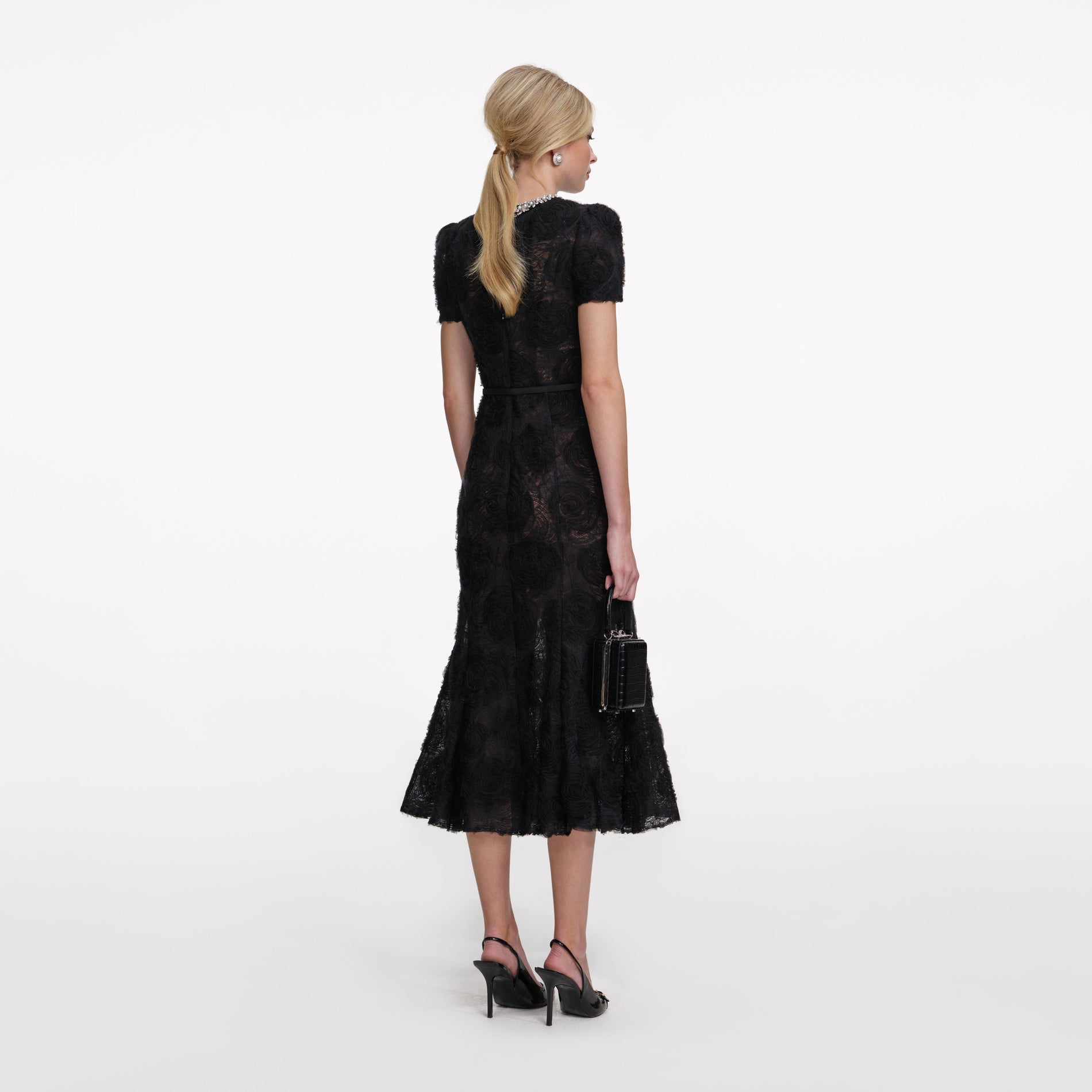 Back view of a woman wearing the Black Tulle Lace Midi Dress