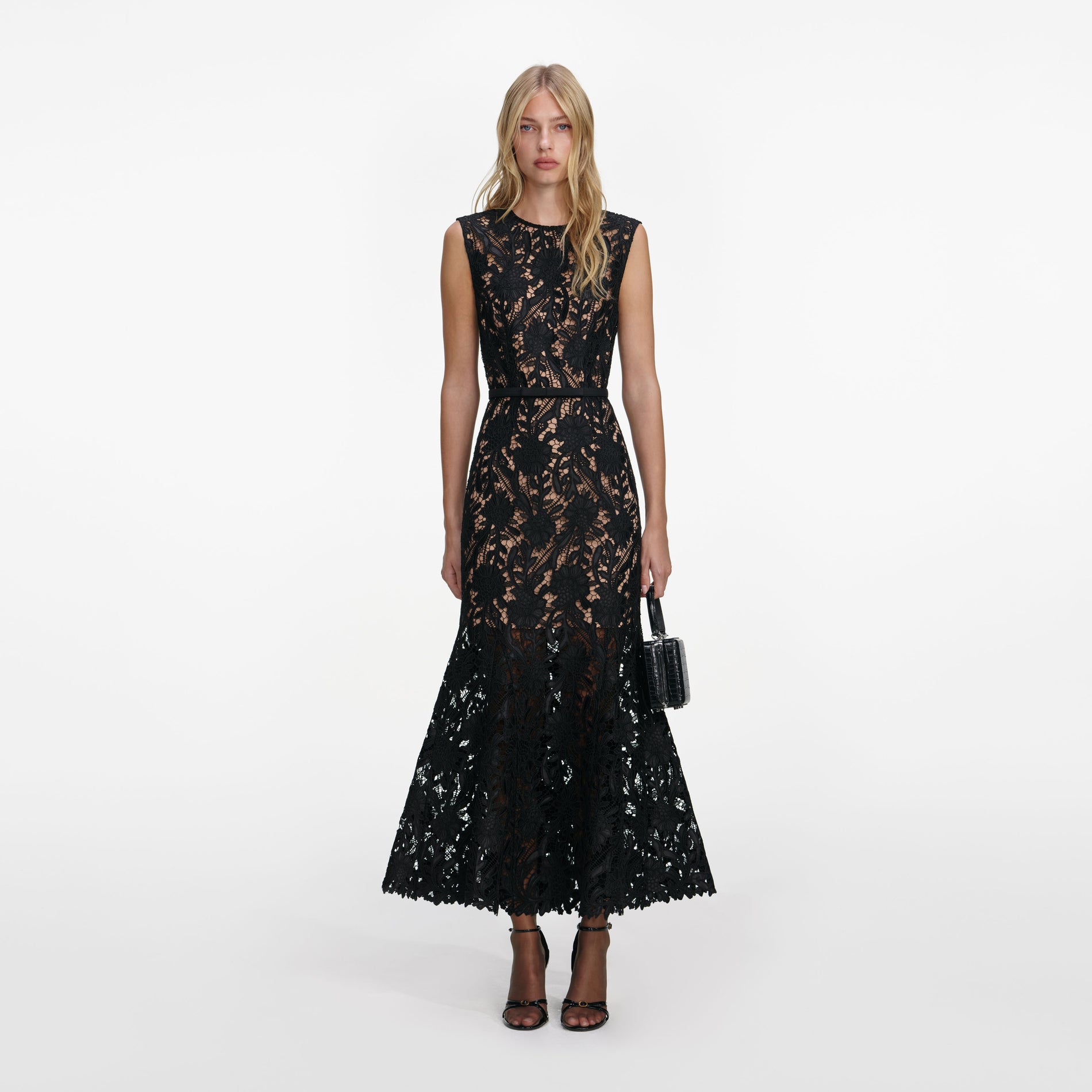 Front view of a woman wearing the Black Guipure Lace Midi Dress