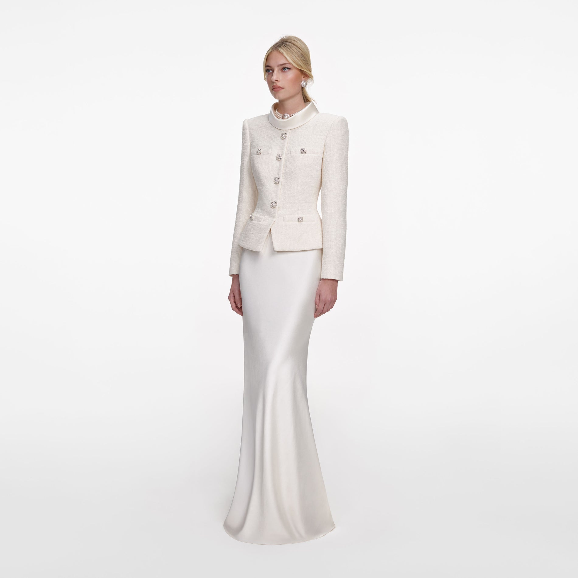 Side view of a woman wearing the Cream Boucle Collared Maxi Dress