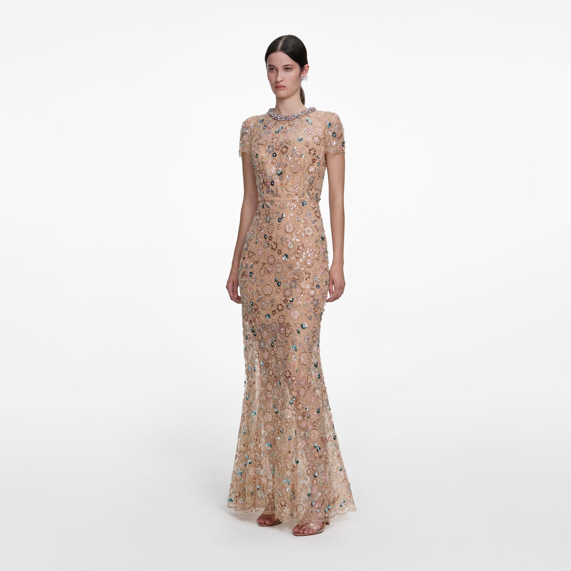 Side view of a woman wearing the Champagne Sequin Embroidered Maxi Dress