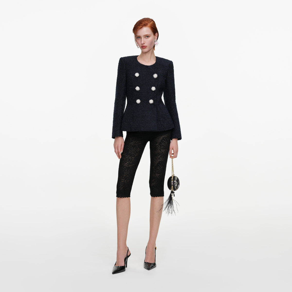Front view of a woman wearing the Navy Boucle Jacket