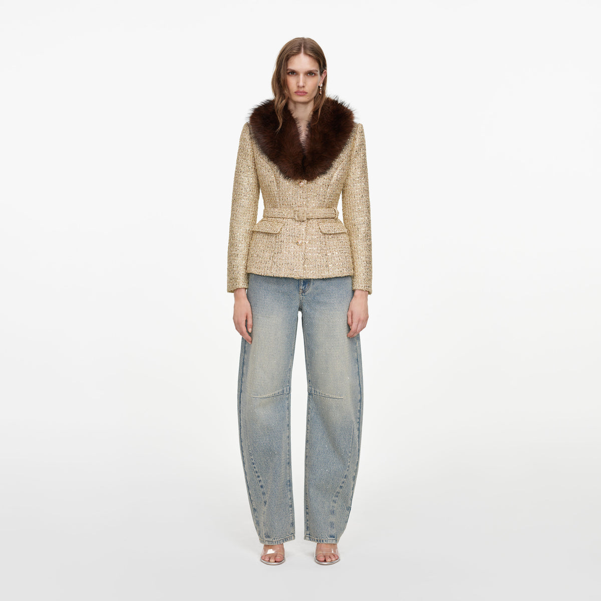 Front view of a woman wearing the Gold Sequin Boucle Fur Collar Jacket