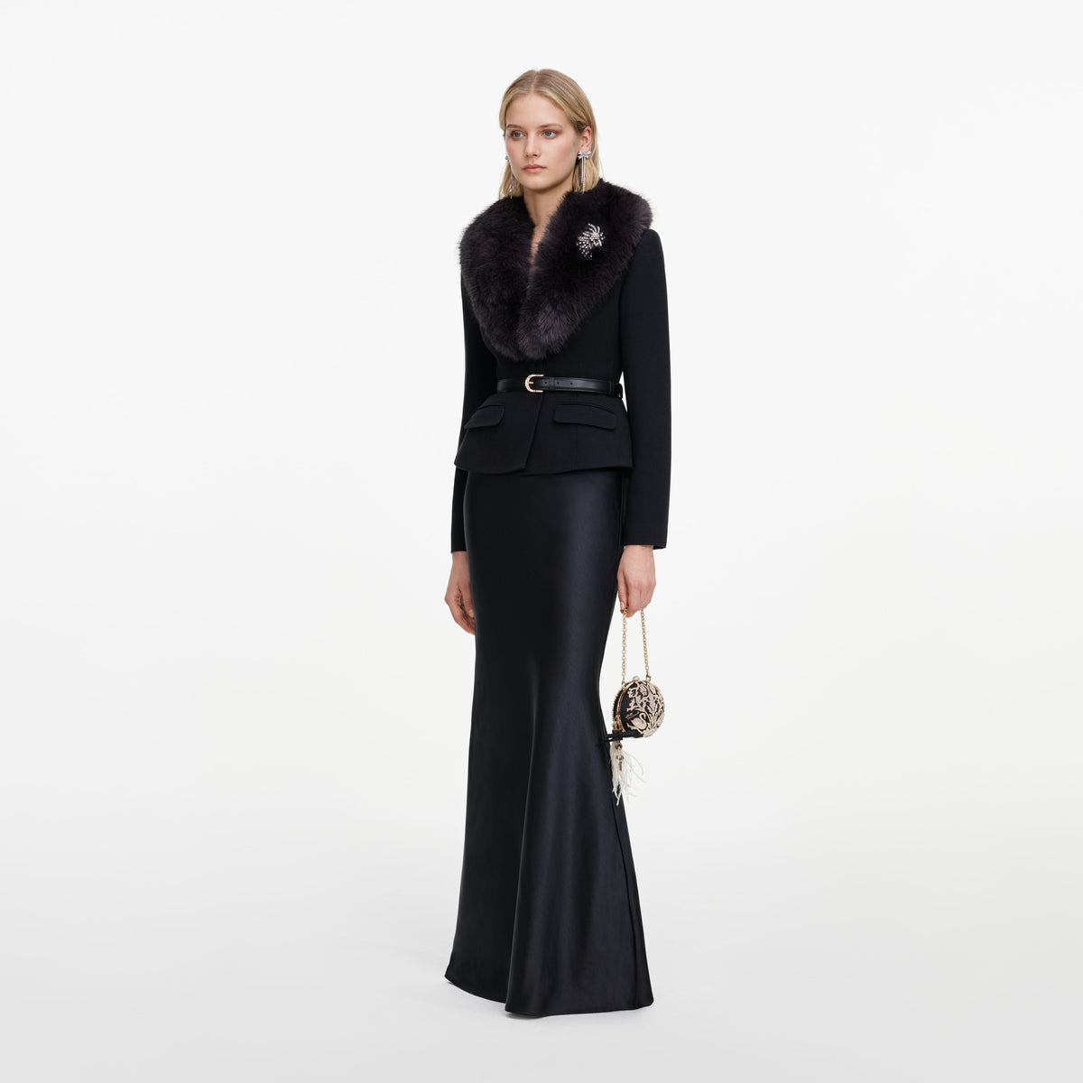 Side view of a woman wearing the Black Tailored Fur Collar Maxi Dress