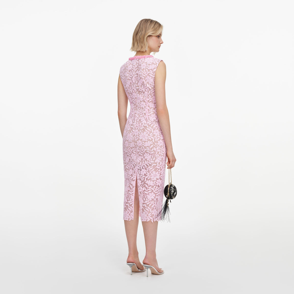 Back view of a woman wearing the Pink Lace Beaded Trim Midi Dress